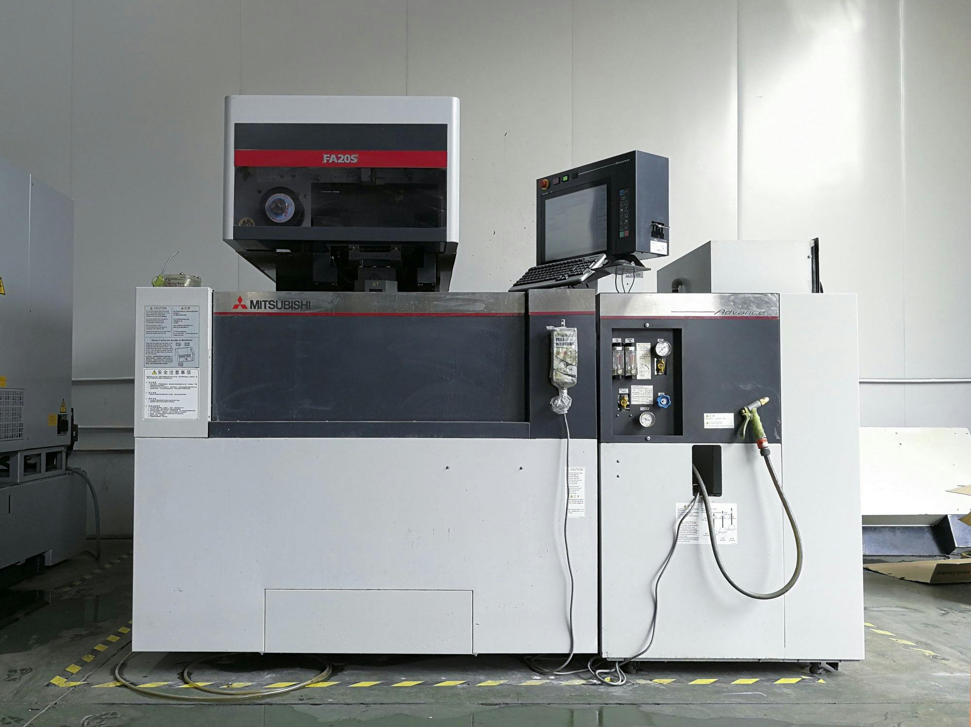 Front view of Mitsubishi Electric FA20S machine