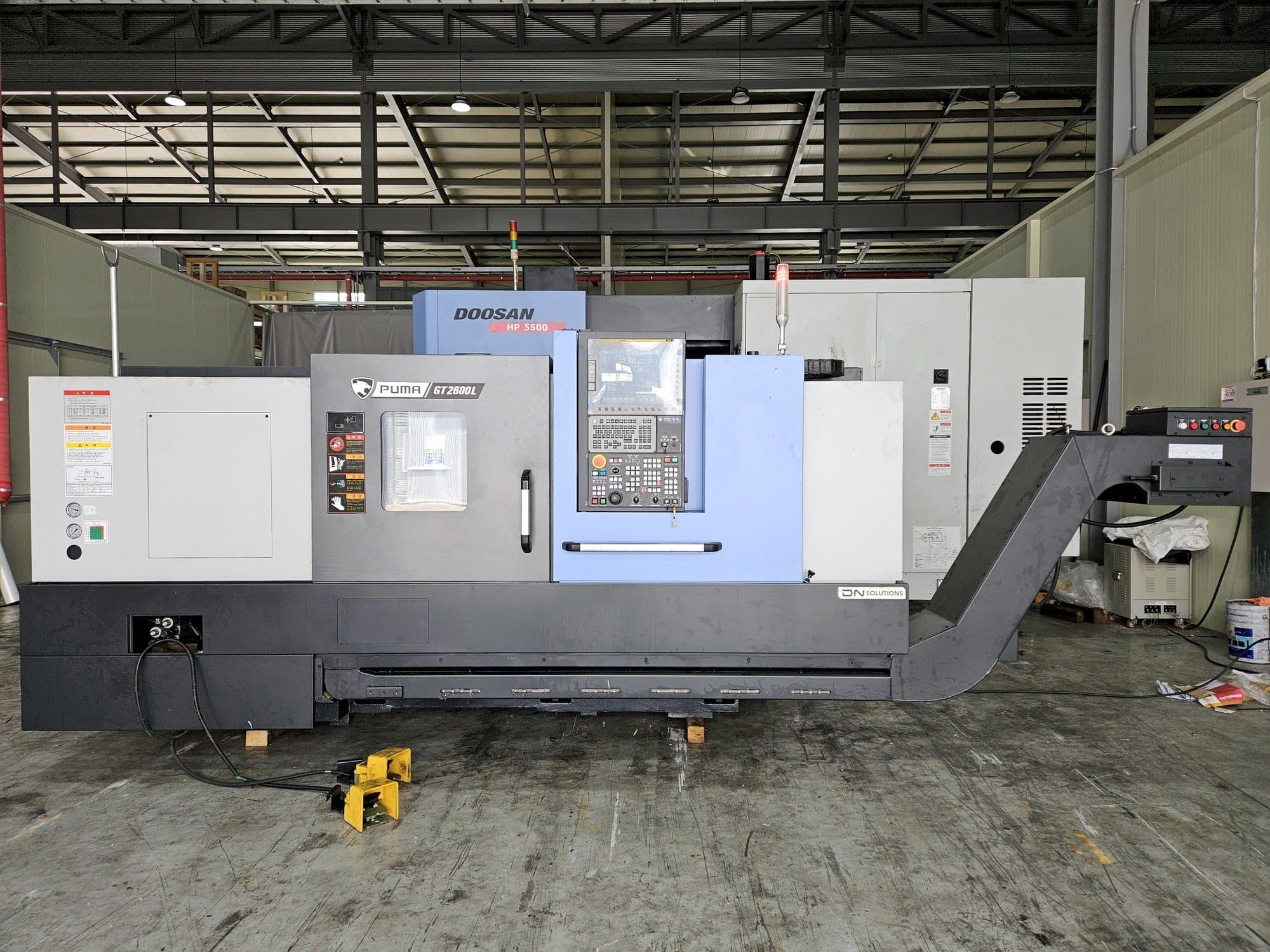 Front view of DN SOLUTIONS PUMA GT2600L machine