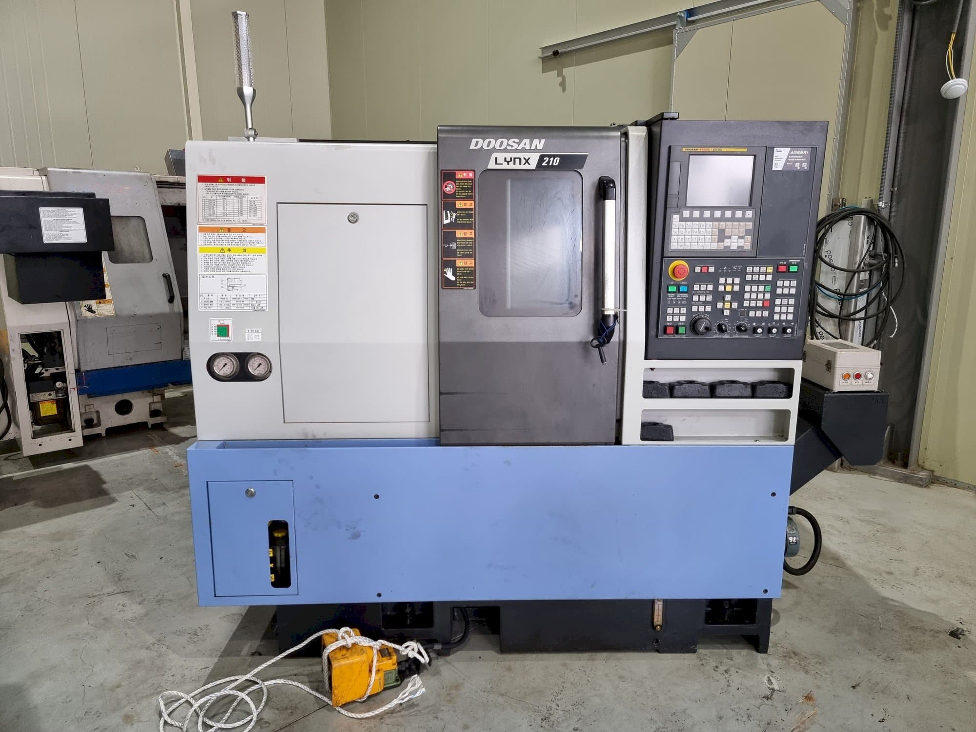 Front view of Doosan LYNX 210 machine