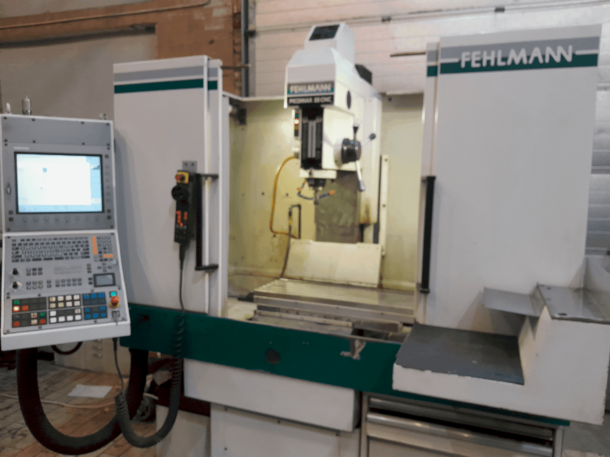 Front view of FEHLMANN PICOMAX 55 CNC 2/3 machine