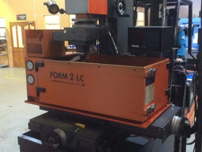 Front view of CHARMILLES Form 2-LC machine