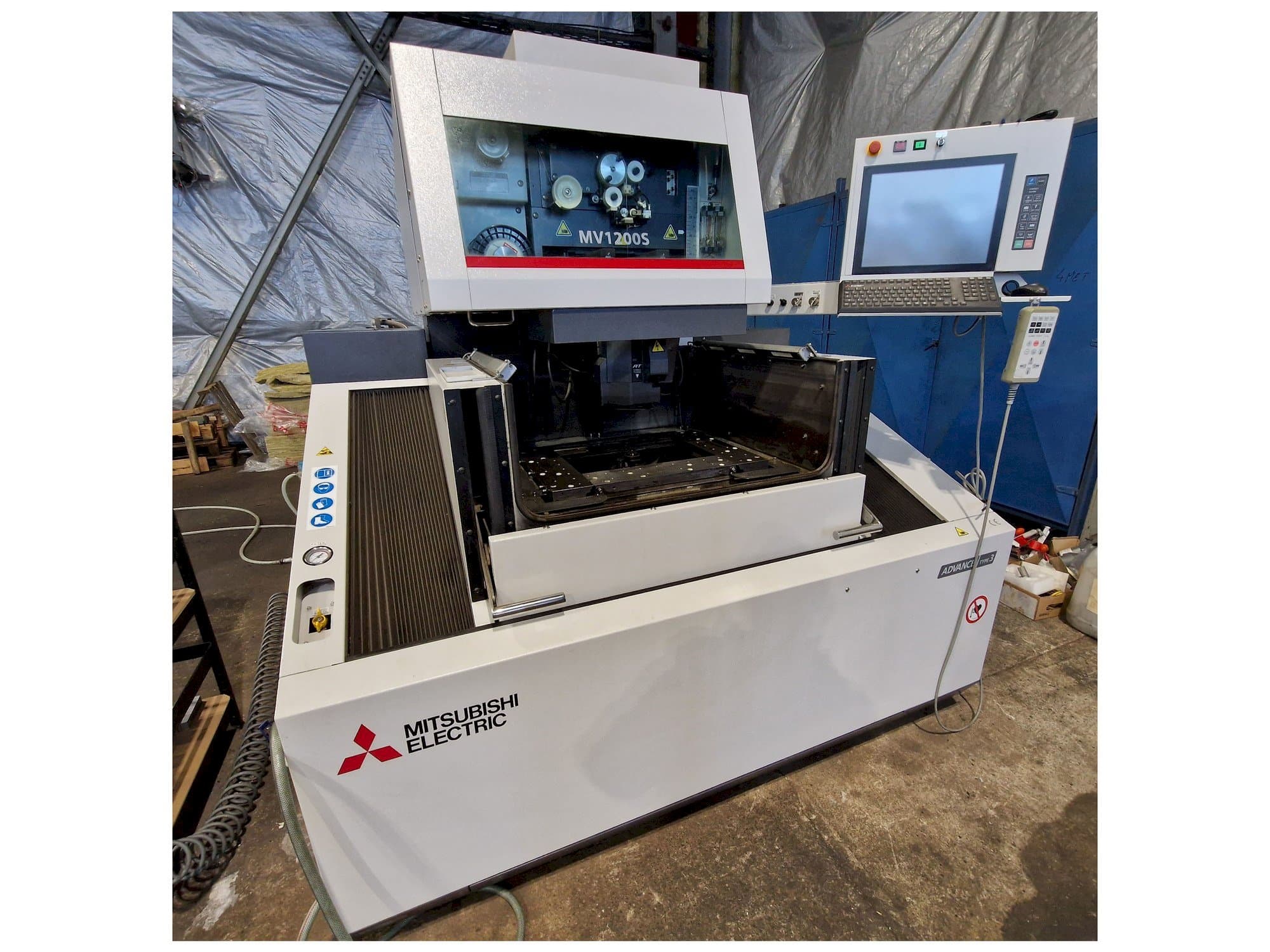 Front view of Mitsubishi MV1200S machine