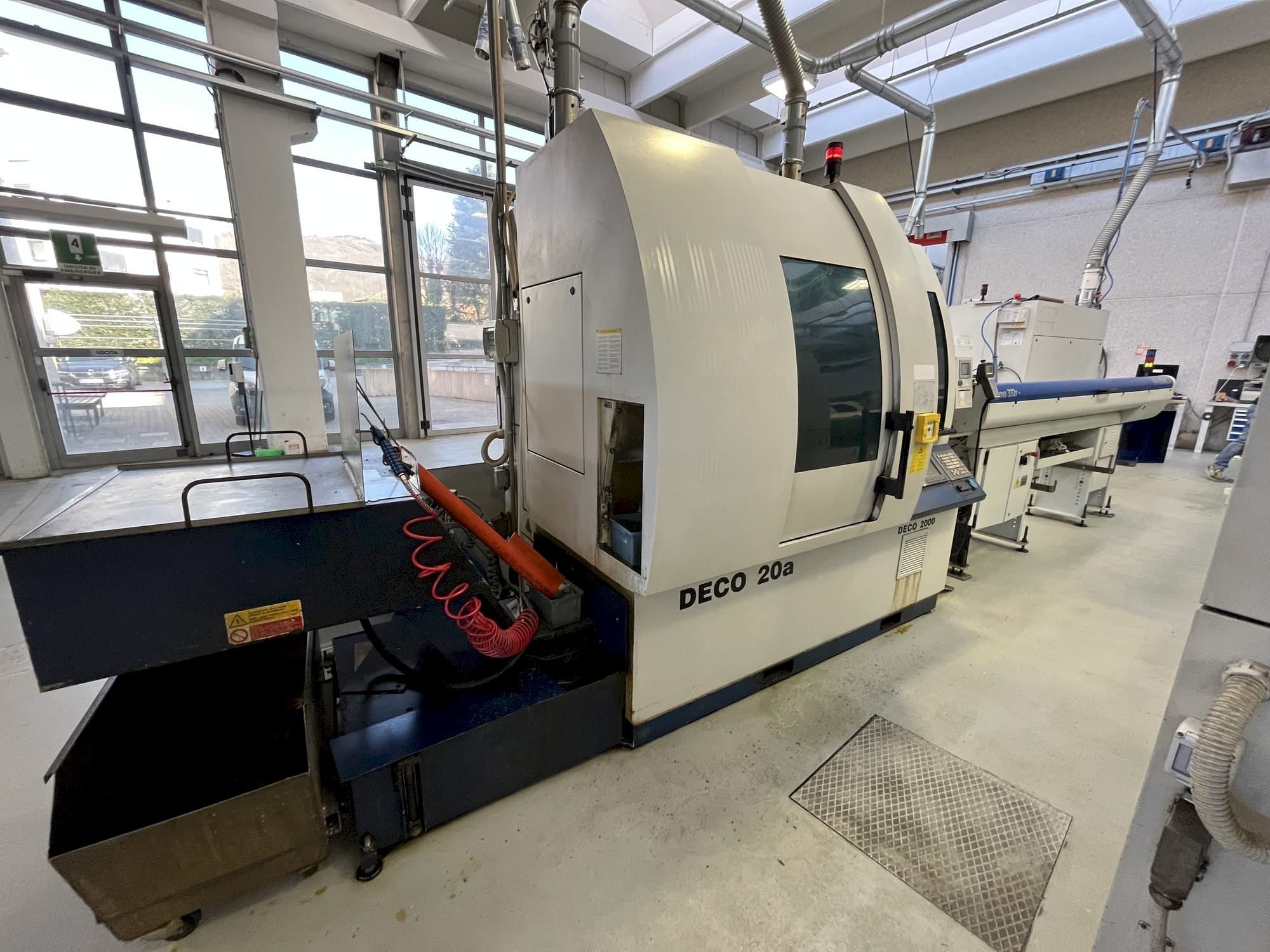 Front view of TORNOS DECO 20A machine