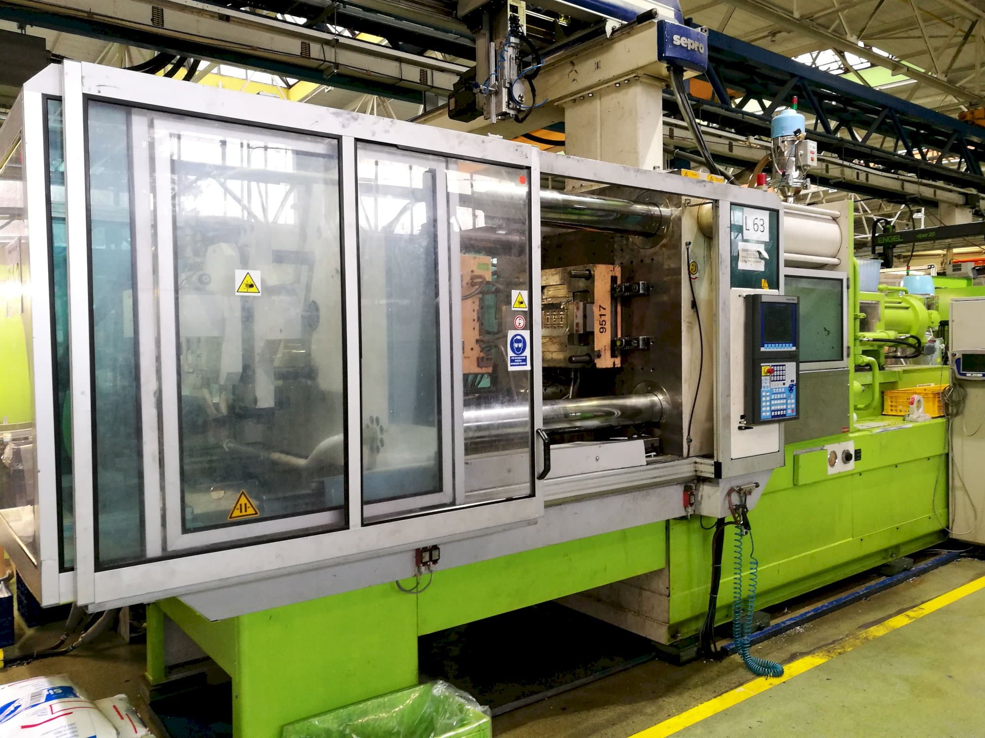 Left view of Krauss Maffei 420-1900 C2 Machine