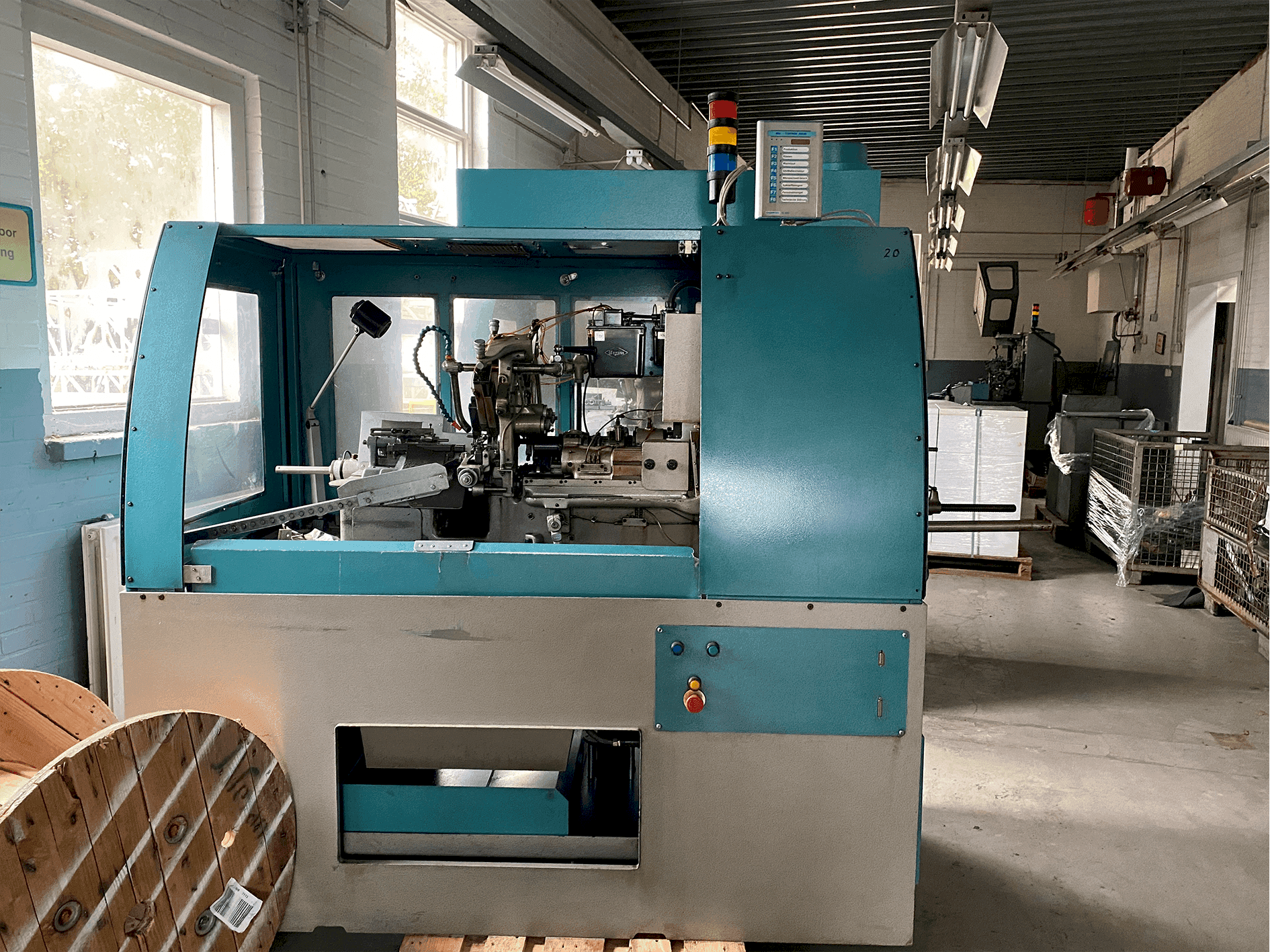 Front view of Tornos-Bechler NAT-125 vario machine