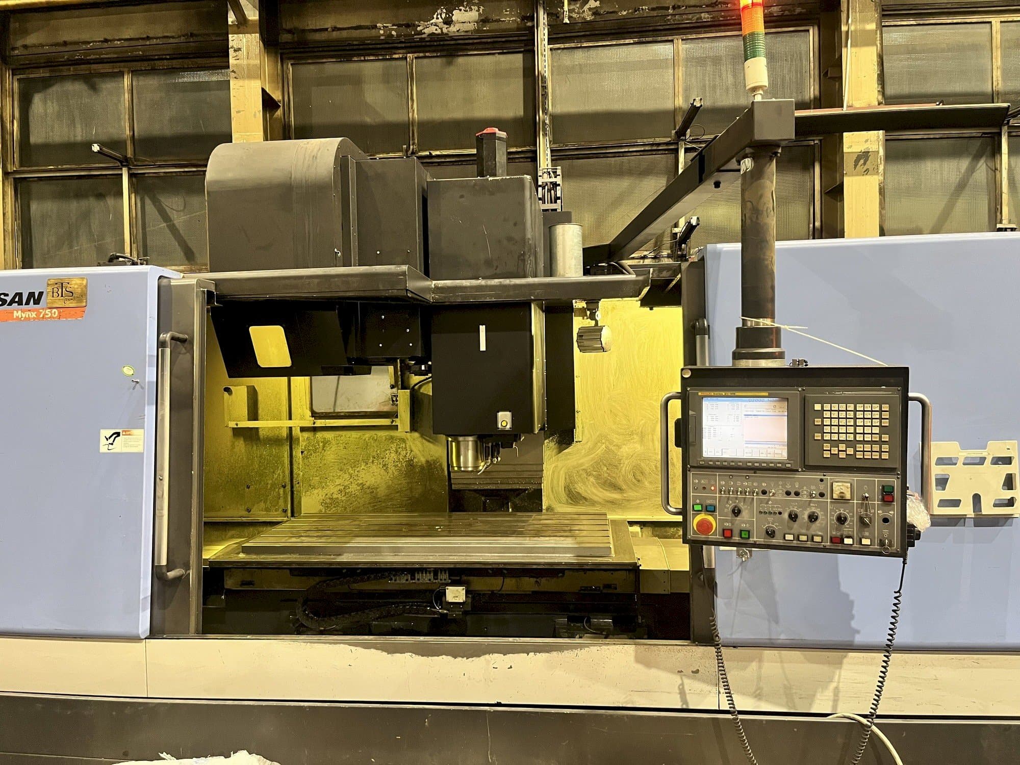 Front view of Doosan MYNX 750 machine