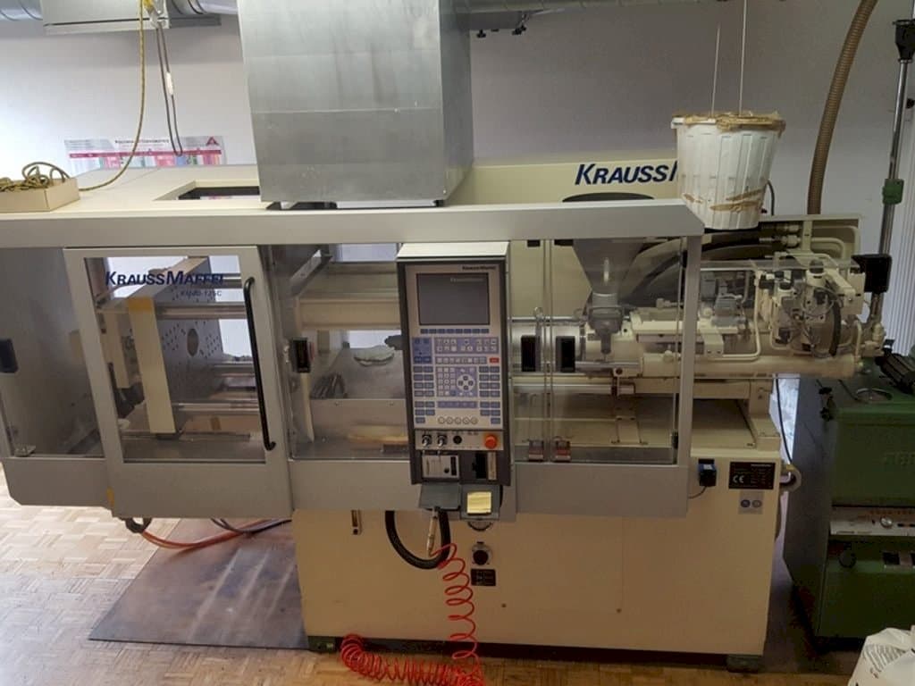 Front view of Krauss Maffei 40-125 C Winner machine