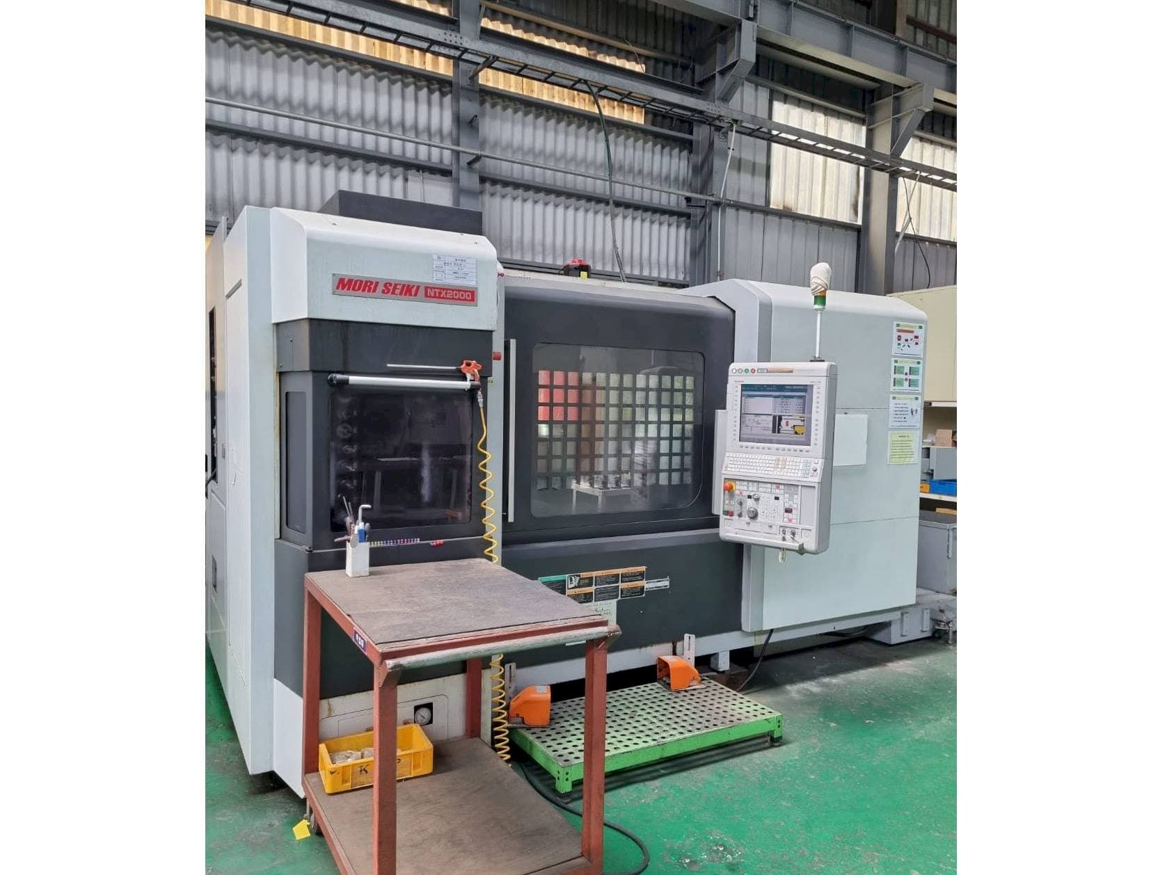 Front view of DMG Mori Seiki NTX2000/1500S machine