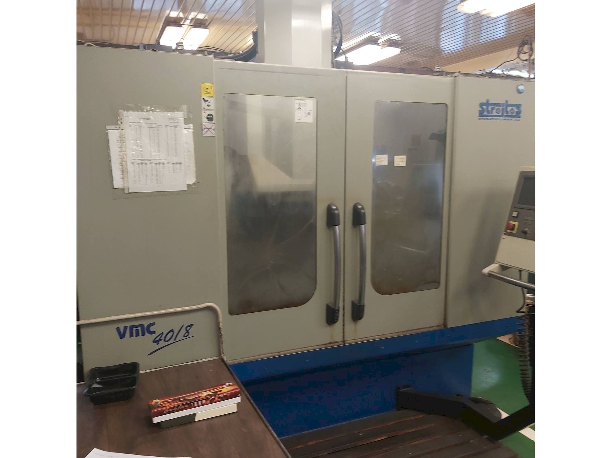 Front view of Strojtos VMC 40/8 machine