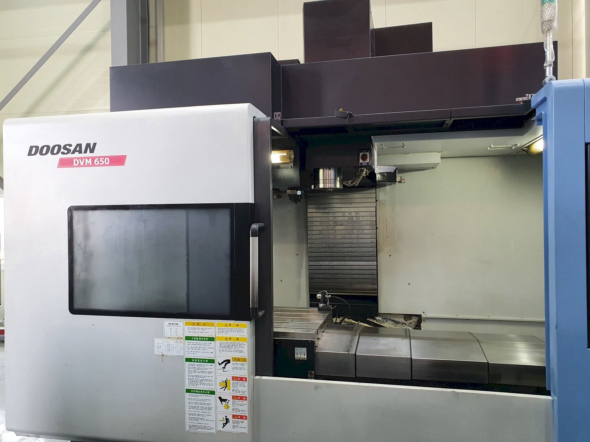Front view of Doosan DVM 650 machine