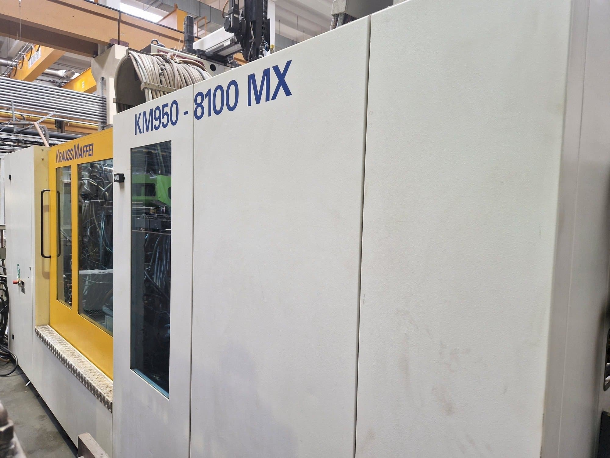 Front view of Krauss Maffei 950-8100 MX machine