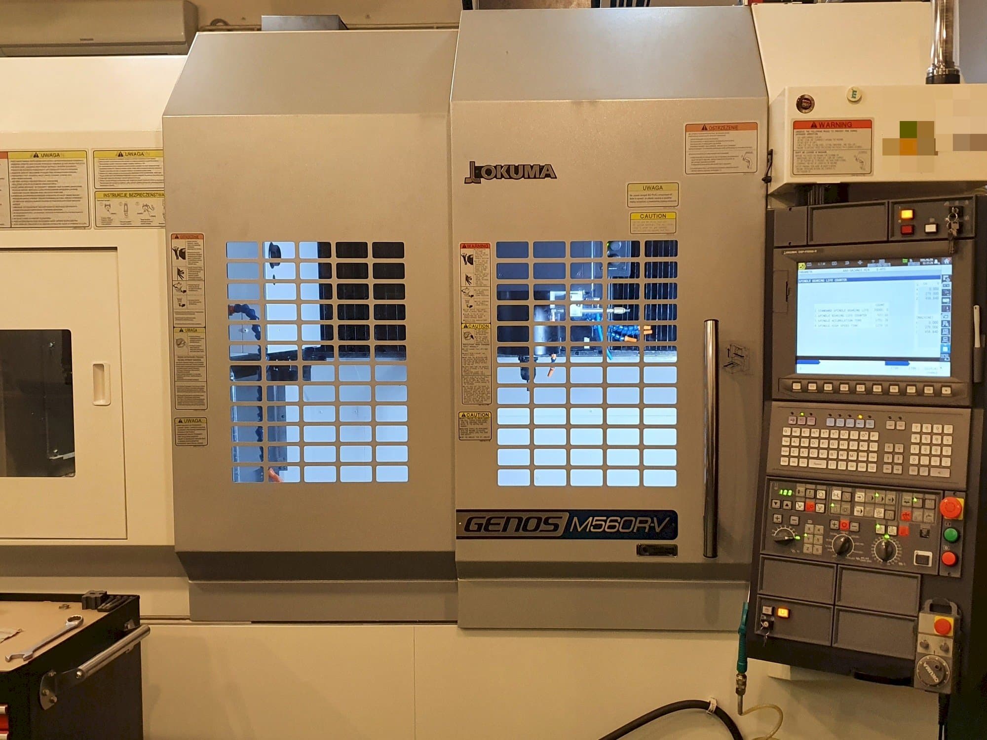 Front view of Okuma GENOS M560R-V machine