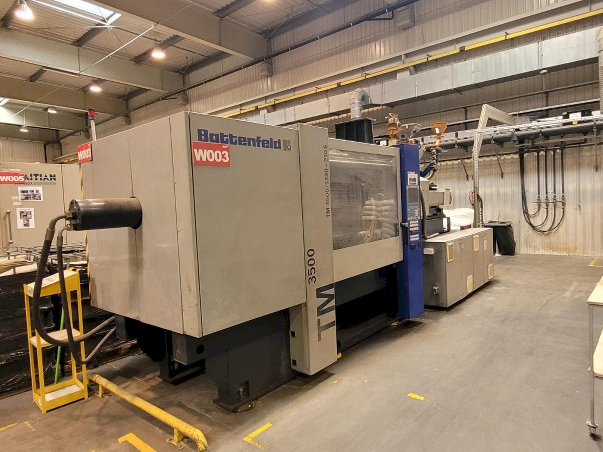 Front view of Battenfeld TM 3500/1330+210S machine