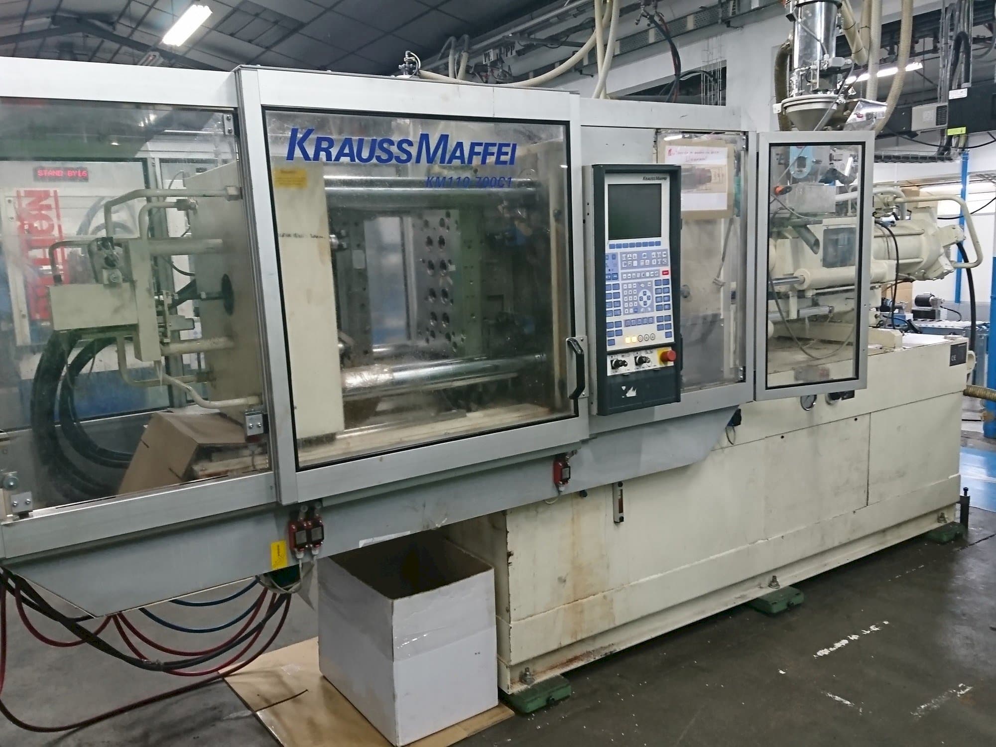 Front view of Krauss Maffei 110 - 700 C1 machine