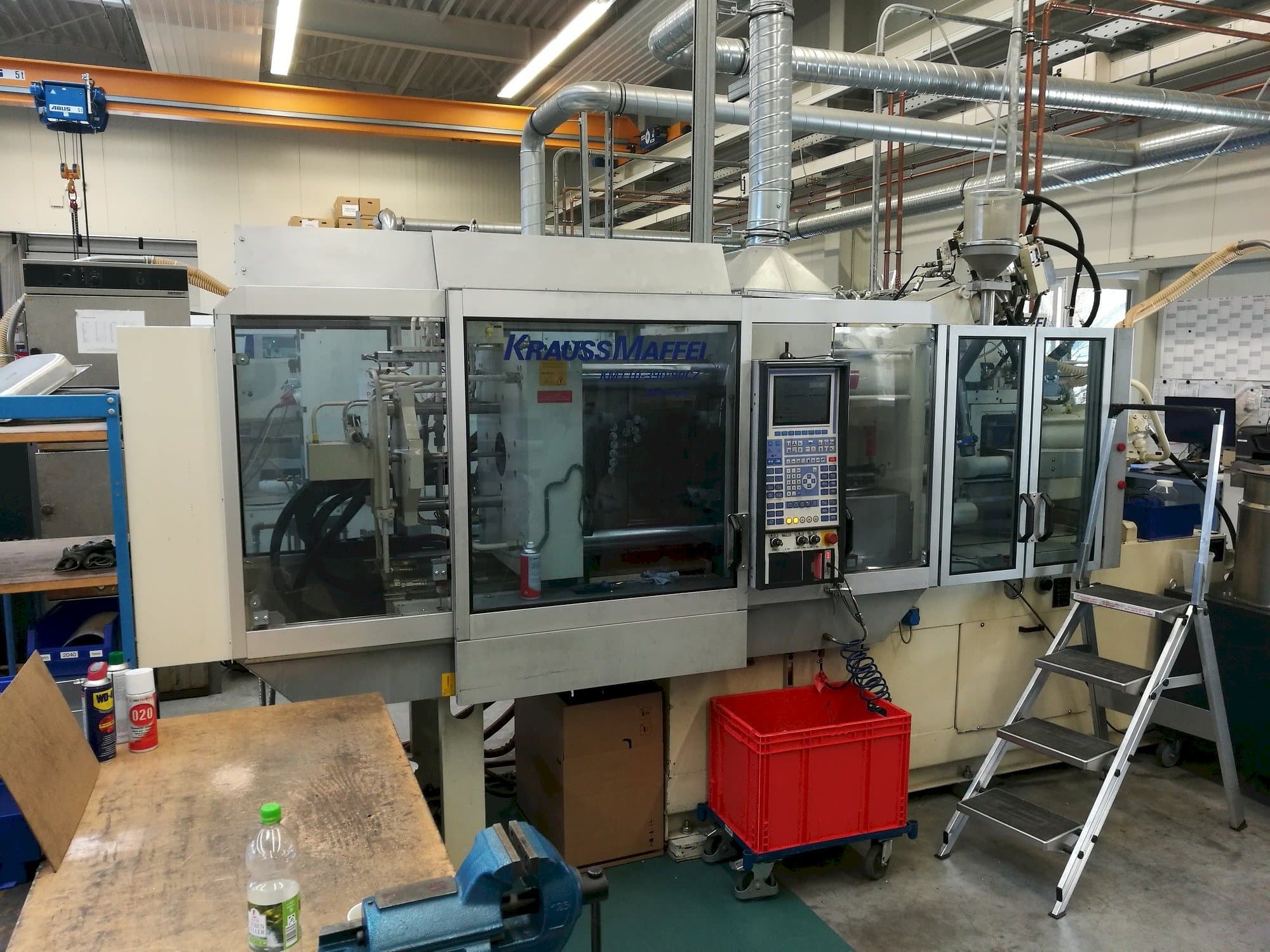 Front view of Krauss Maffei 110-390/90 CZ machine