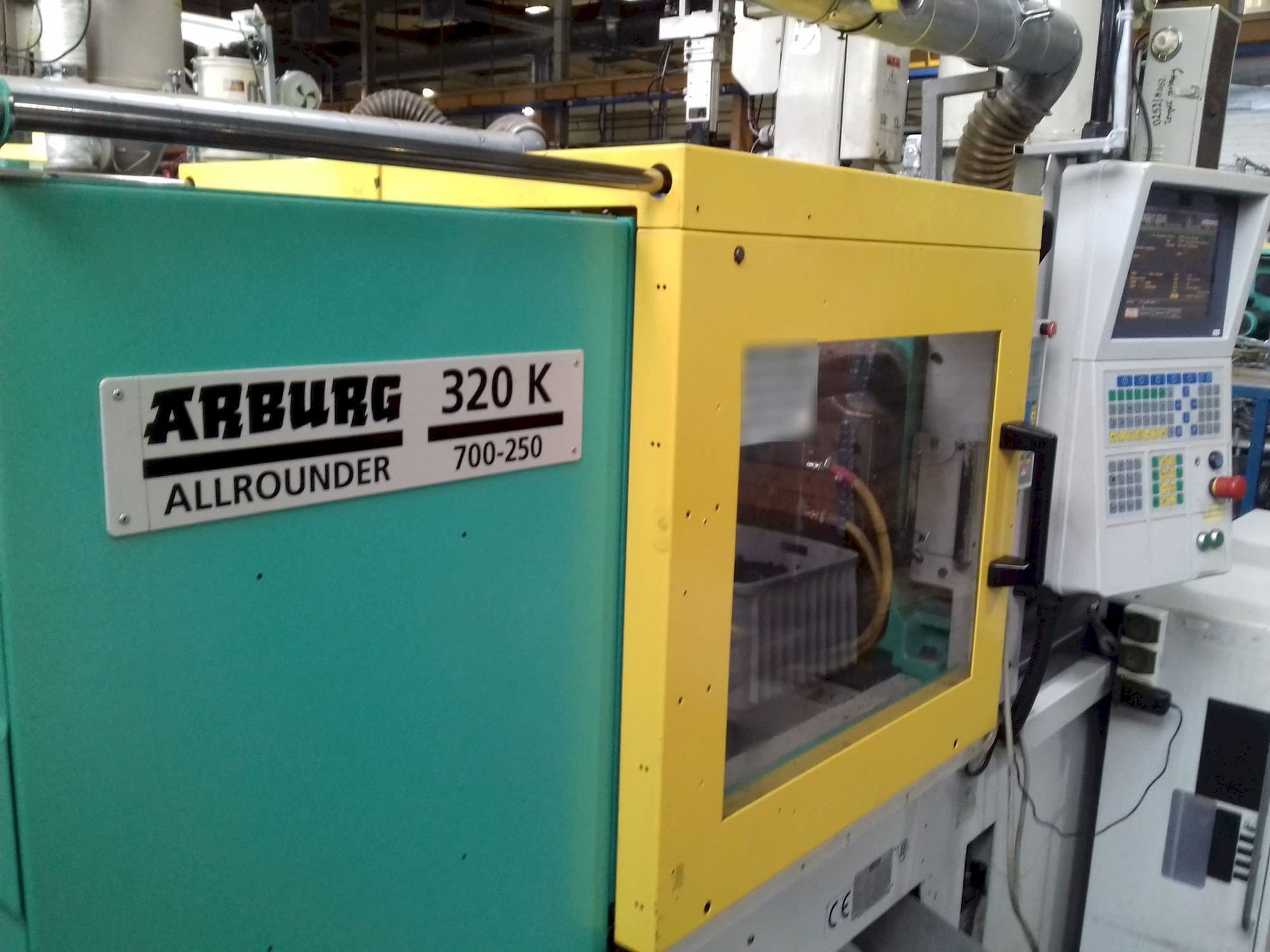 Front view of Arburg ALLROUNDER 320 K 700-250  machine