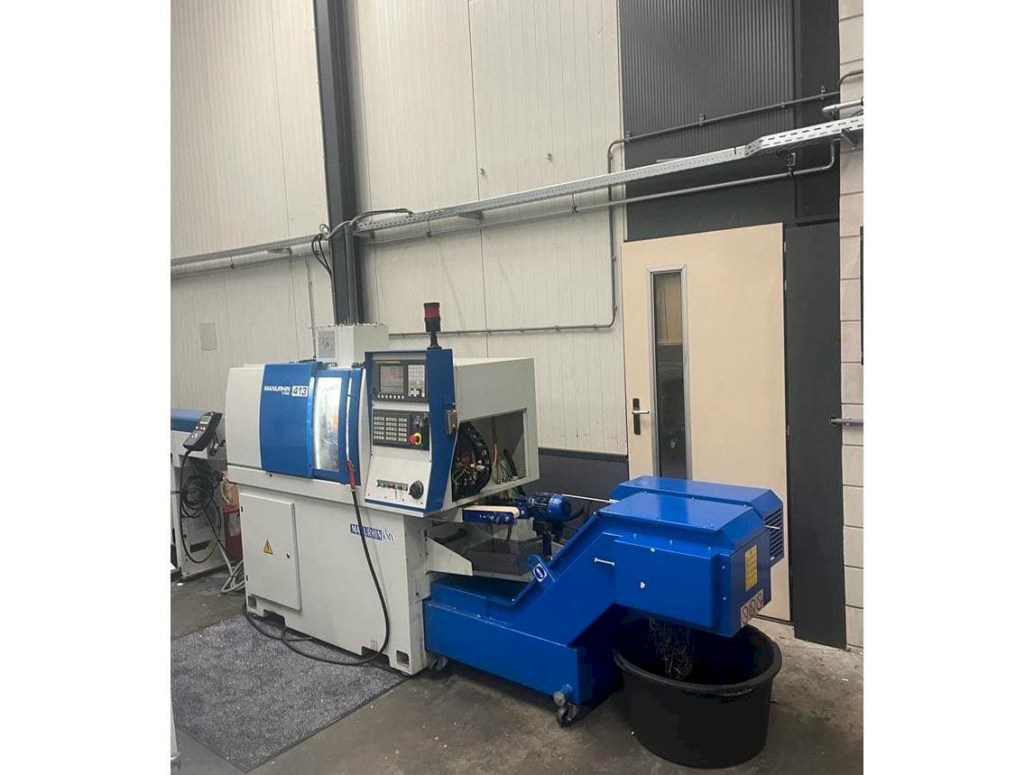 Front view of Manurhin K'MX 413 machine