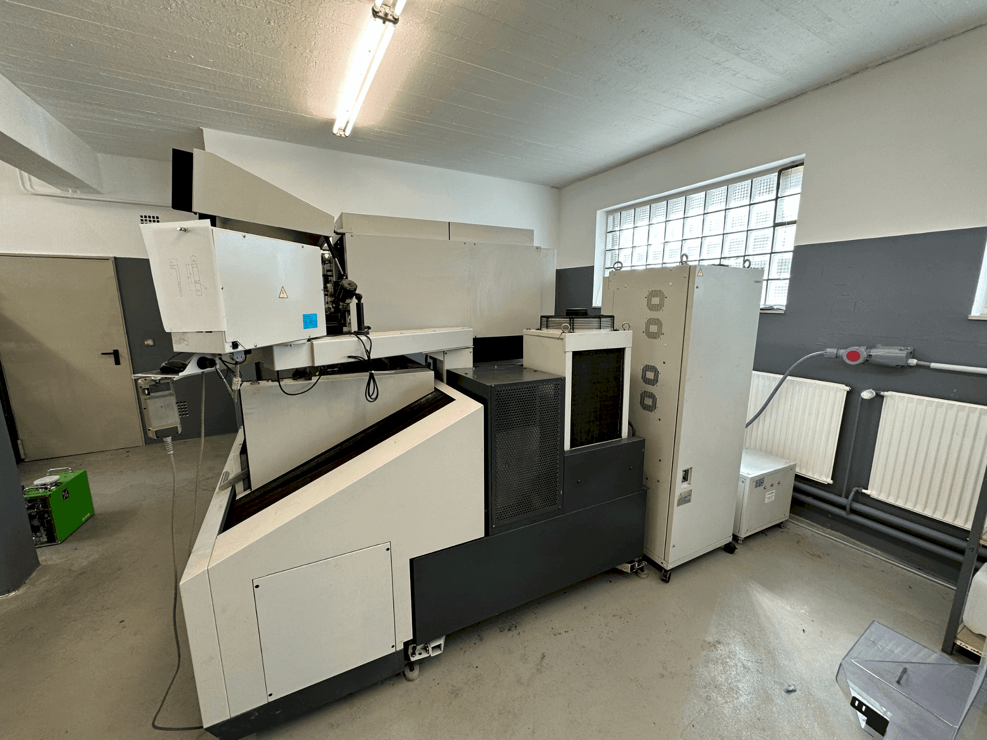 Front view of Mitsubishi MV1200S  machine