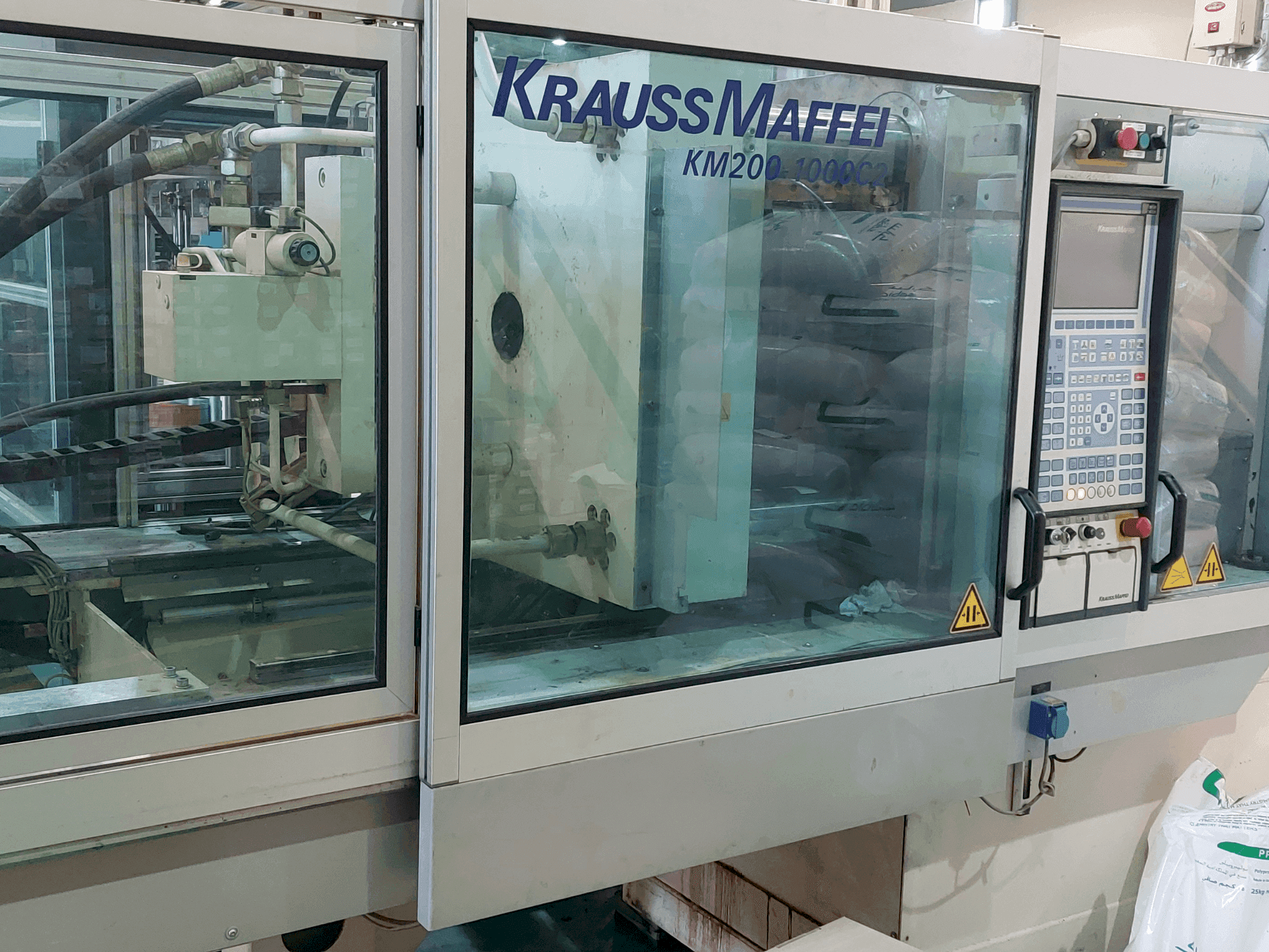 Front view of Krauss Maffei 200-1000 C2  machine