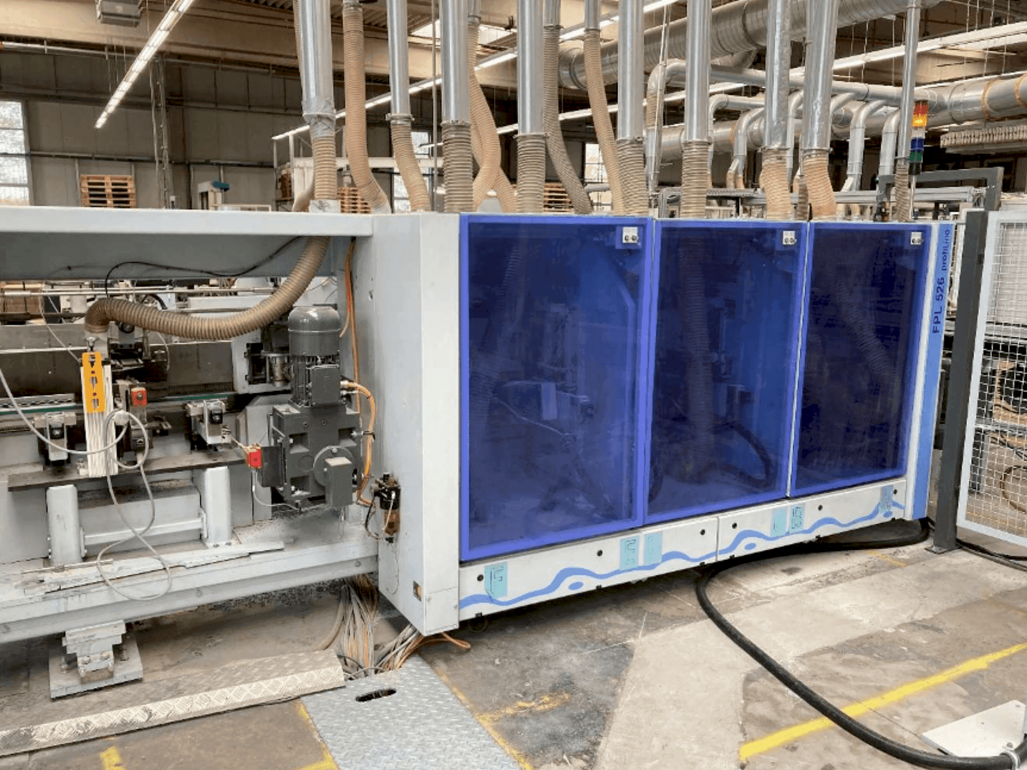 Front view of HOMAG PROFI FPL 525/6/04/PW/V LVT Profiling System  machine