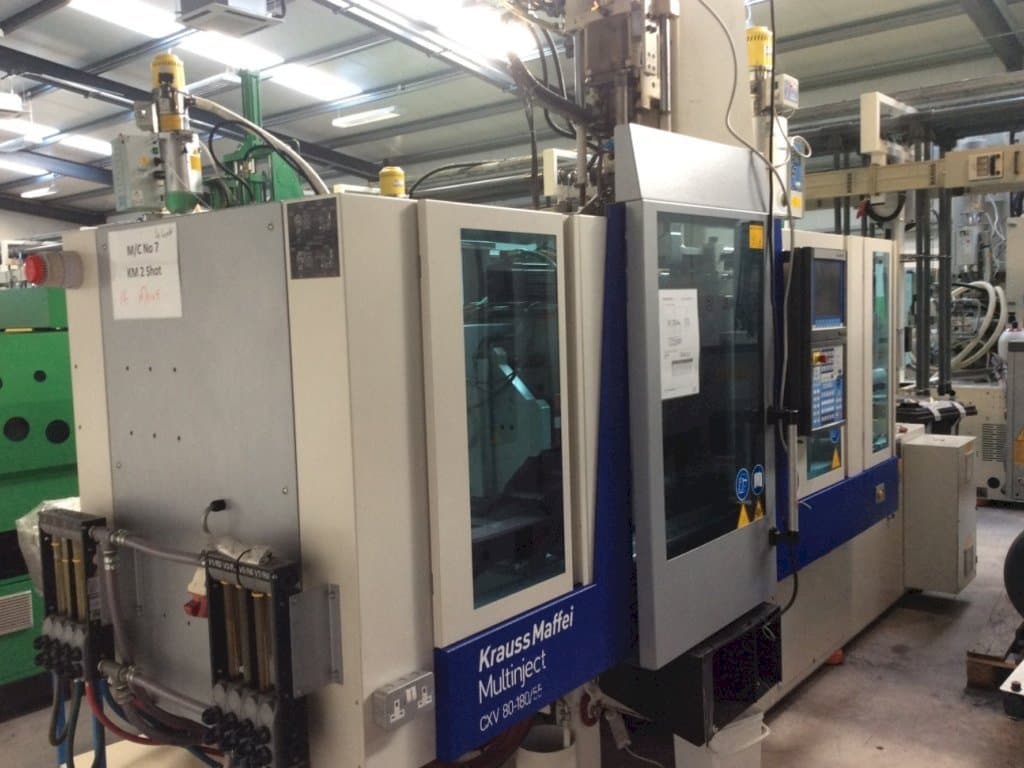 Front view of Krauss Maffei Multinject 80-180-55 CX V machine