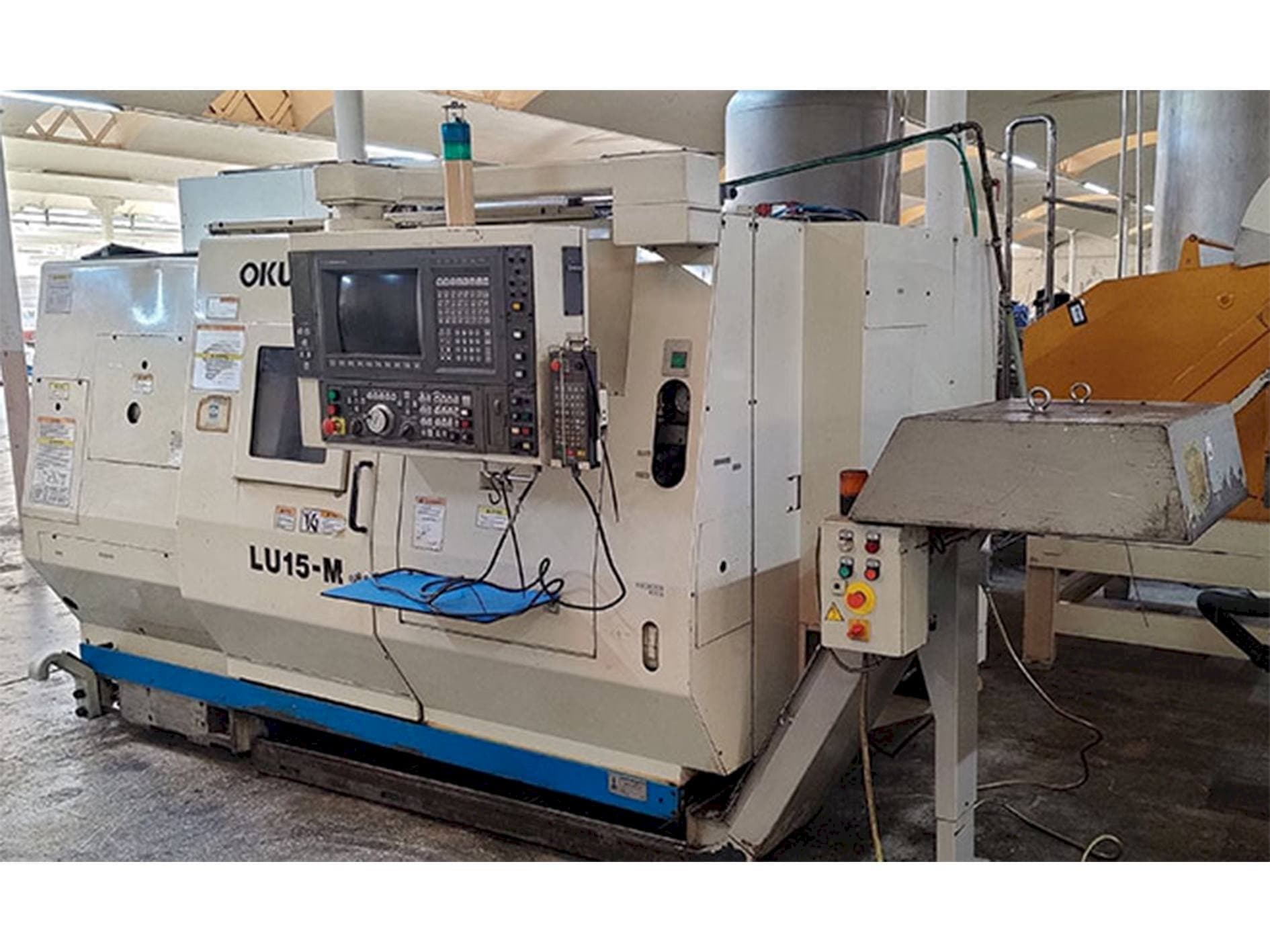 Front view of Okuma LU-15M machine