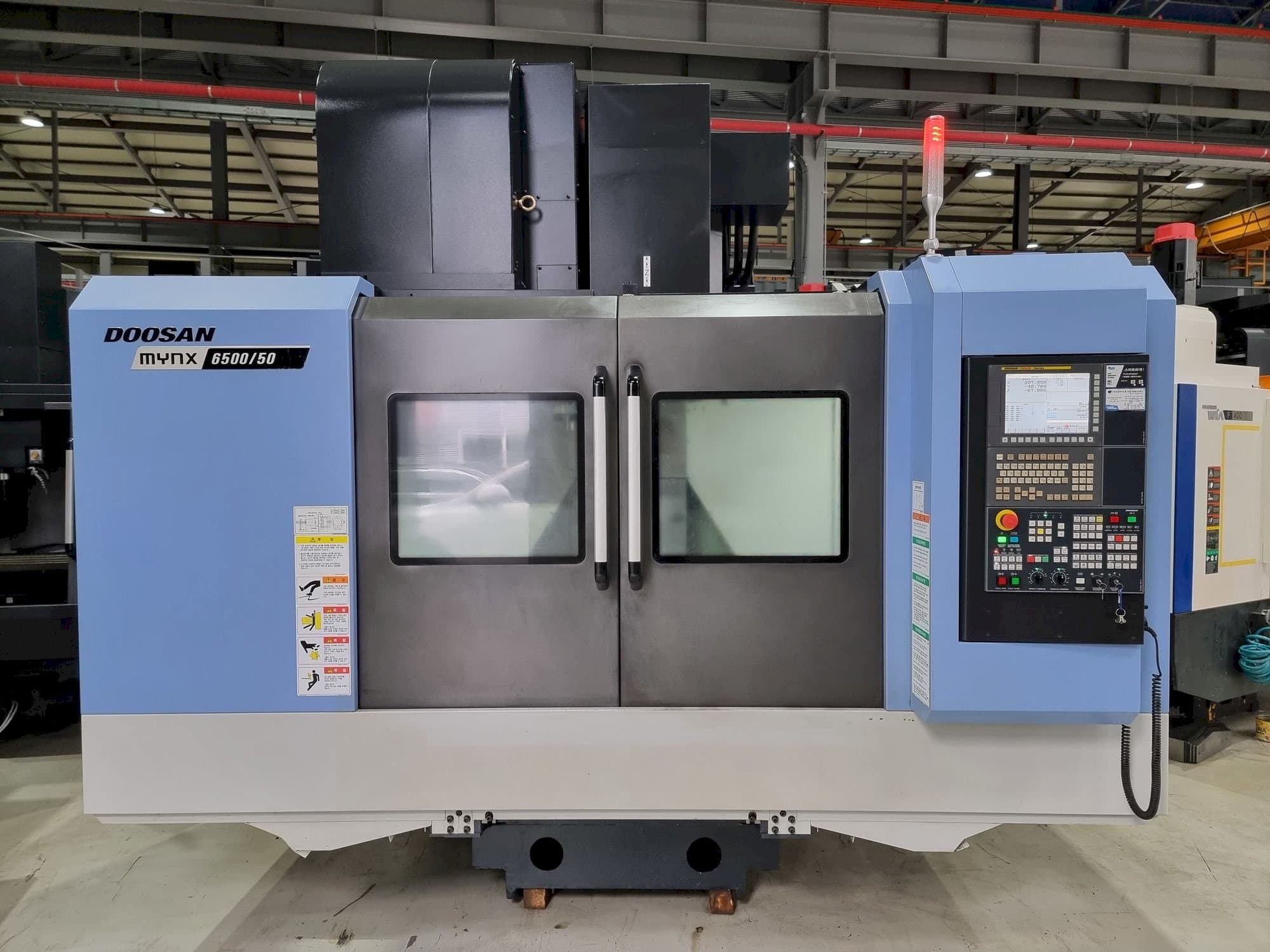 Front view of Doosan MYNX 6500/50 machine