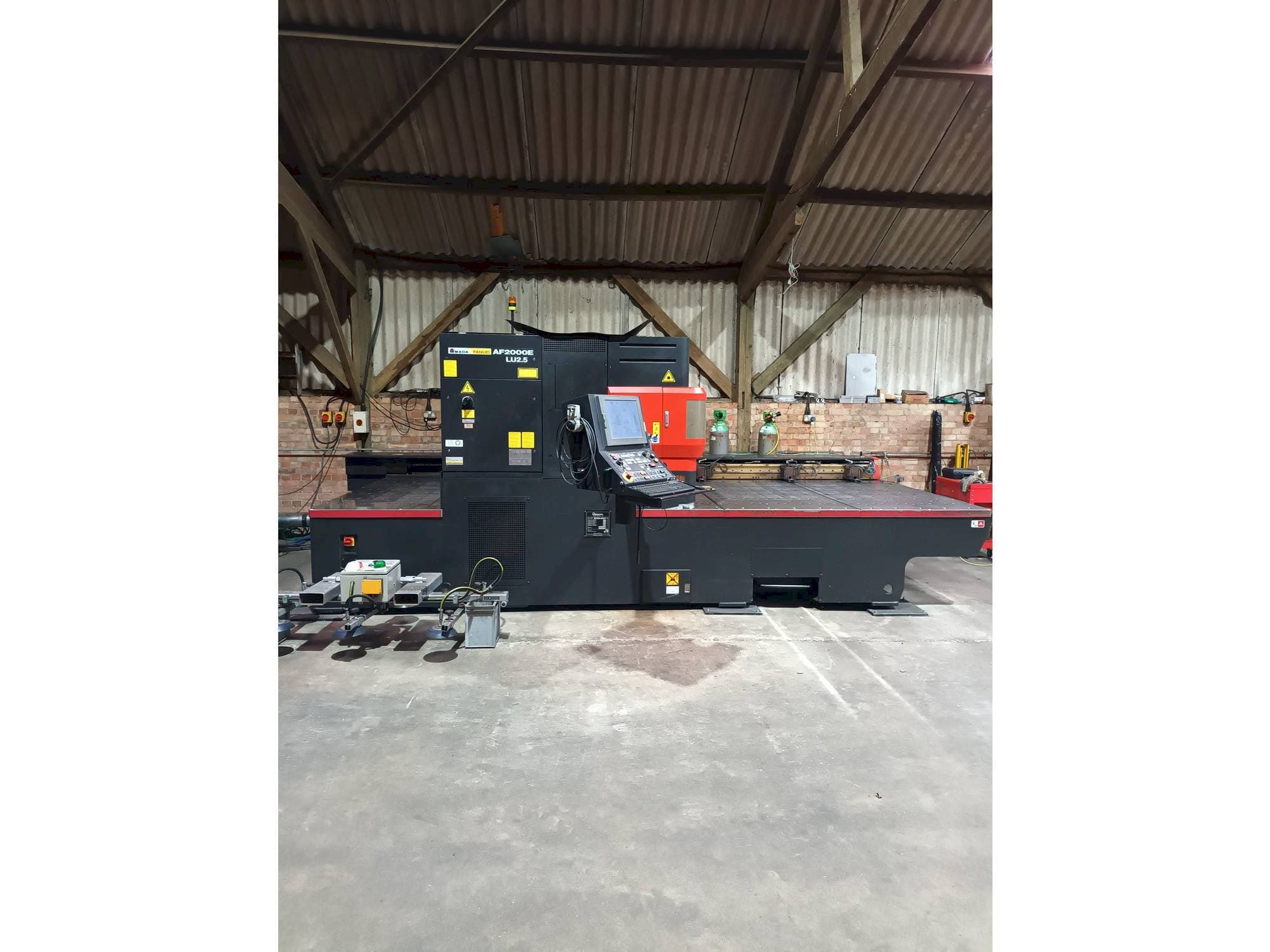 Front view of AMADA LC 2415 alpha 4 NT machine