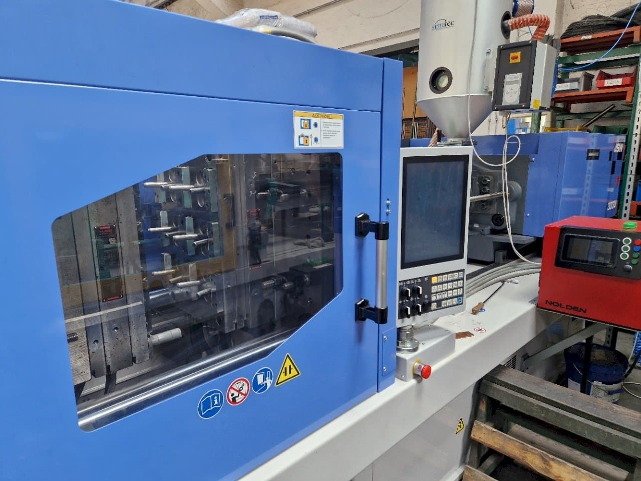 Left side view of JSW J180ADS-300U  machine