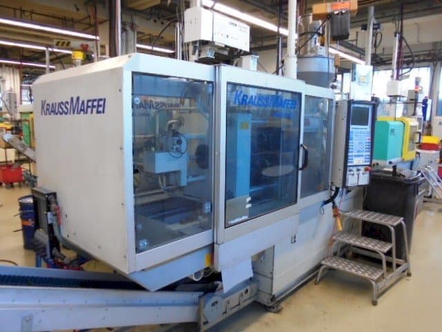 Left side view of Krauss Maffei KM 65-390-C2 machine