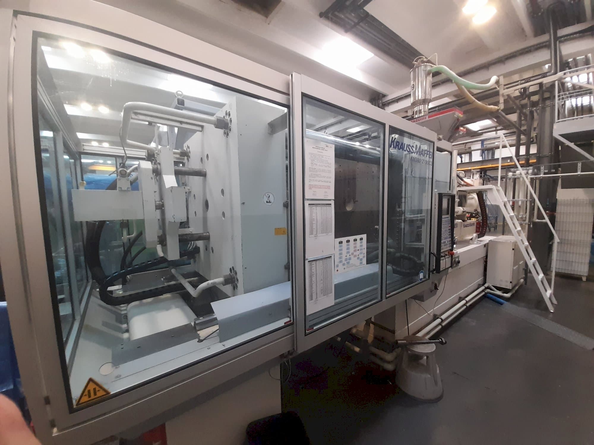 Left side view of Krauss Maffei 380-2700 C3 machine