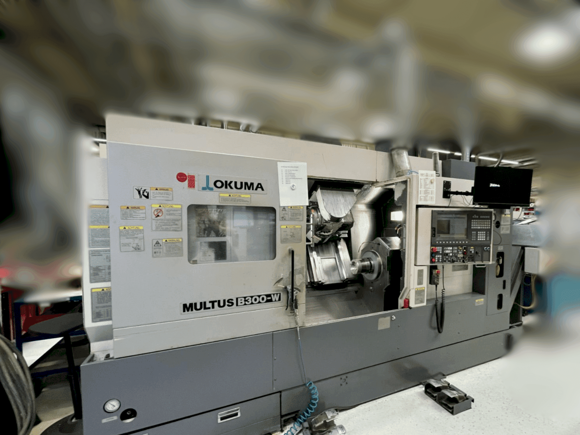 Front view of Okuma Multus B300-W machine