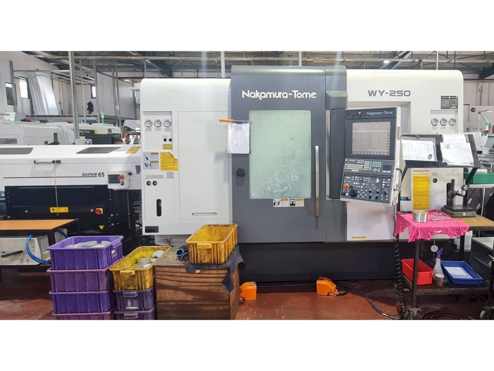 Front view of NAKAMURA-TOME WY 250 machine