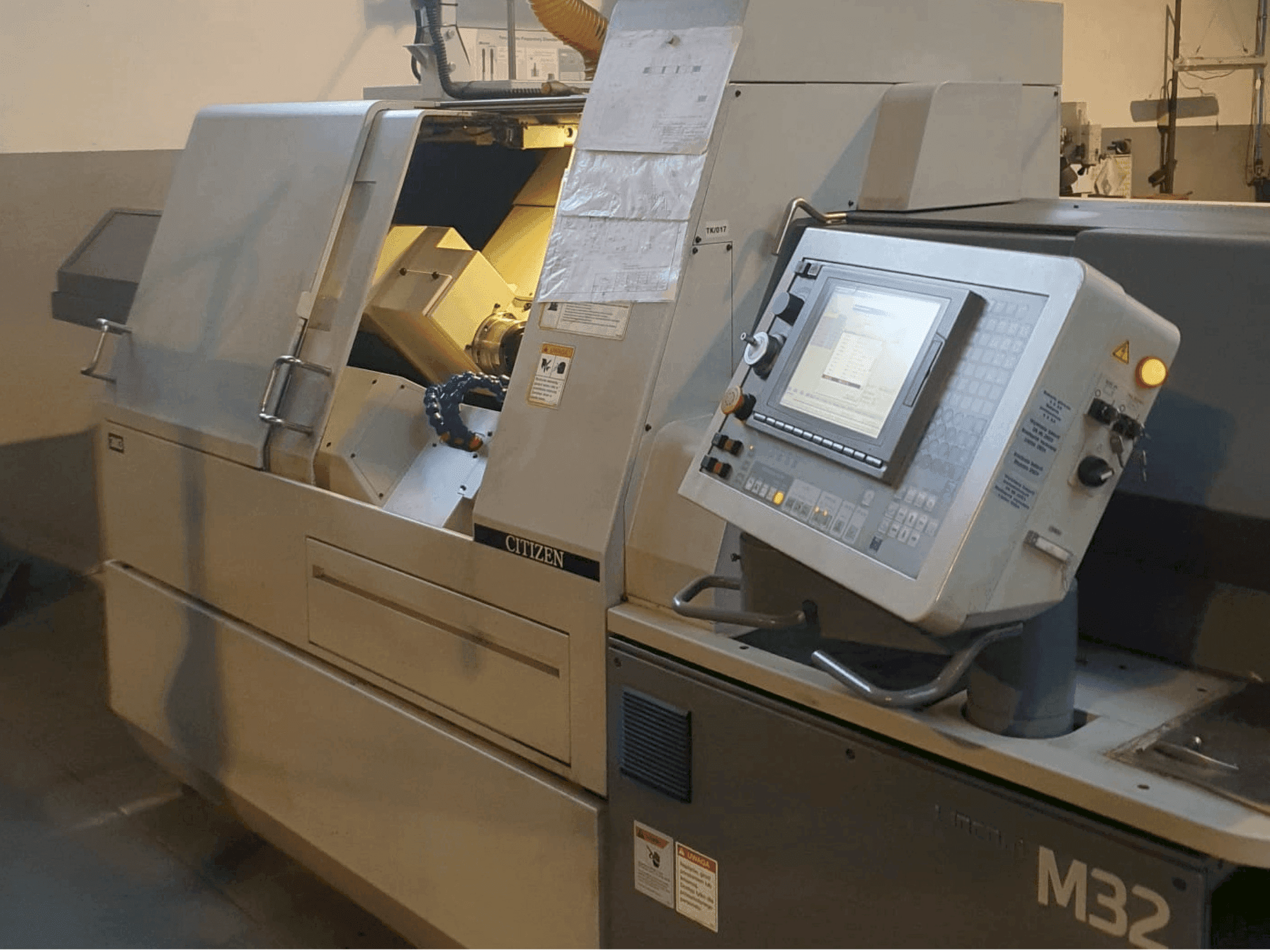 Front view of Citizen M32 III machine