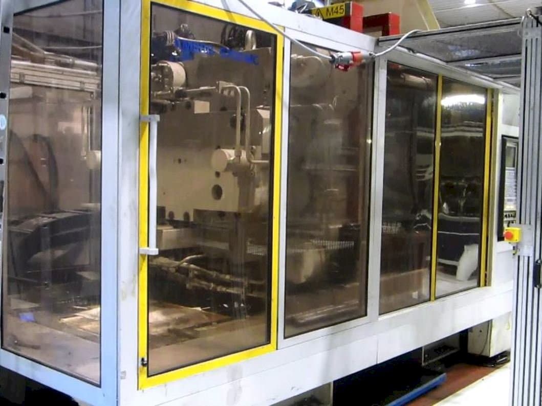 Front view of Krauss Maffei KM 800/5700 MC machine