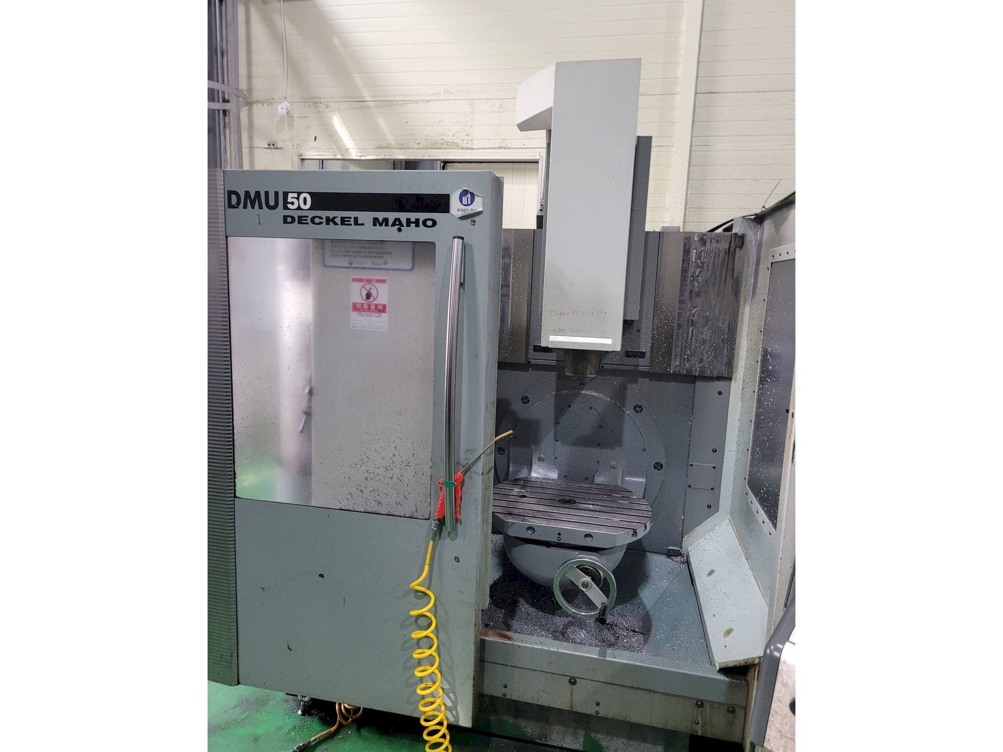 Front view of DECKEL MAHO DMU 50 machine