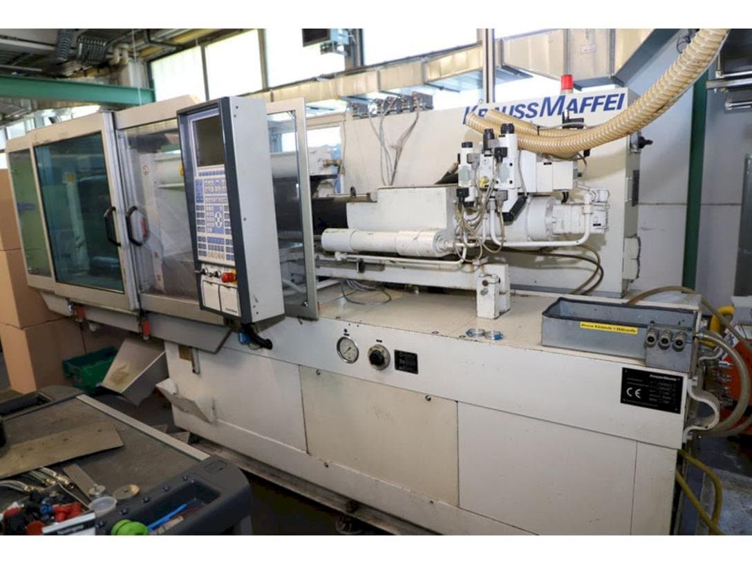 Right side view of Krauss Maffei 65-220 C1 machine