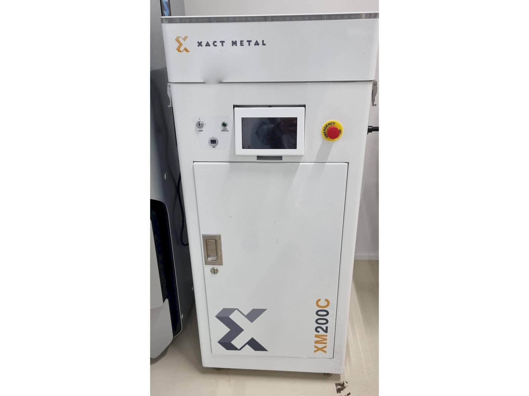 Front view of XACT METAL XM200C-E machine