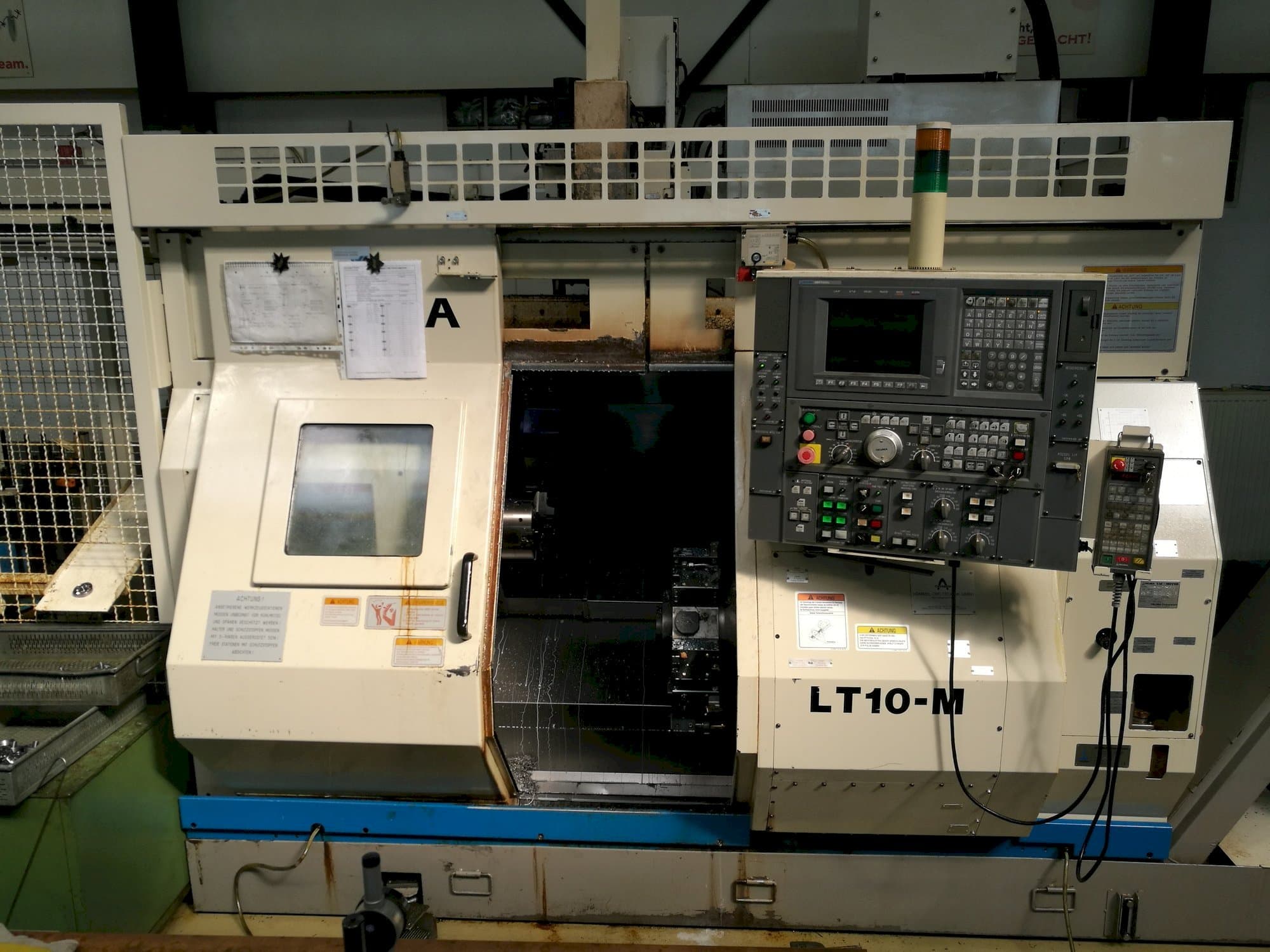 Front view of Okuma LT10-M machine