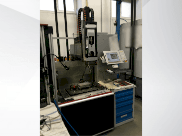 Front view of Exeron EDM 310 MF20 machine