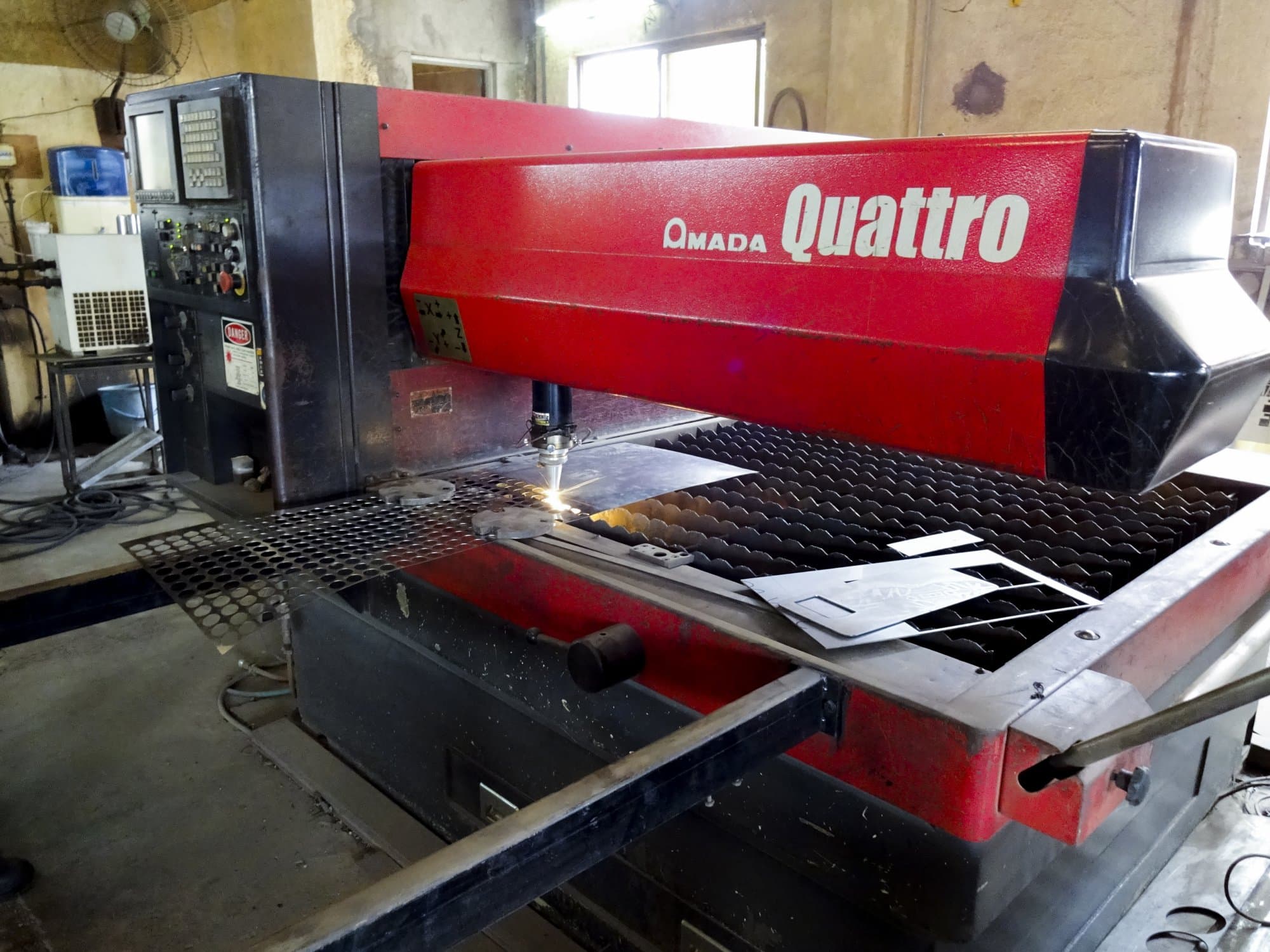Back view of AMADA Quattro AF1000E Machine