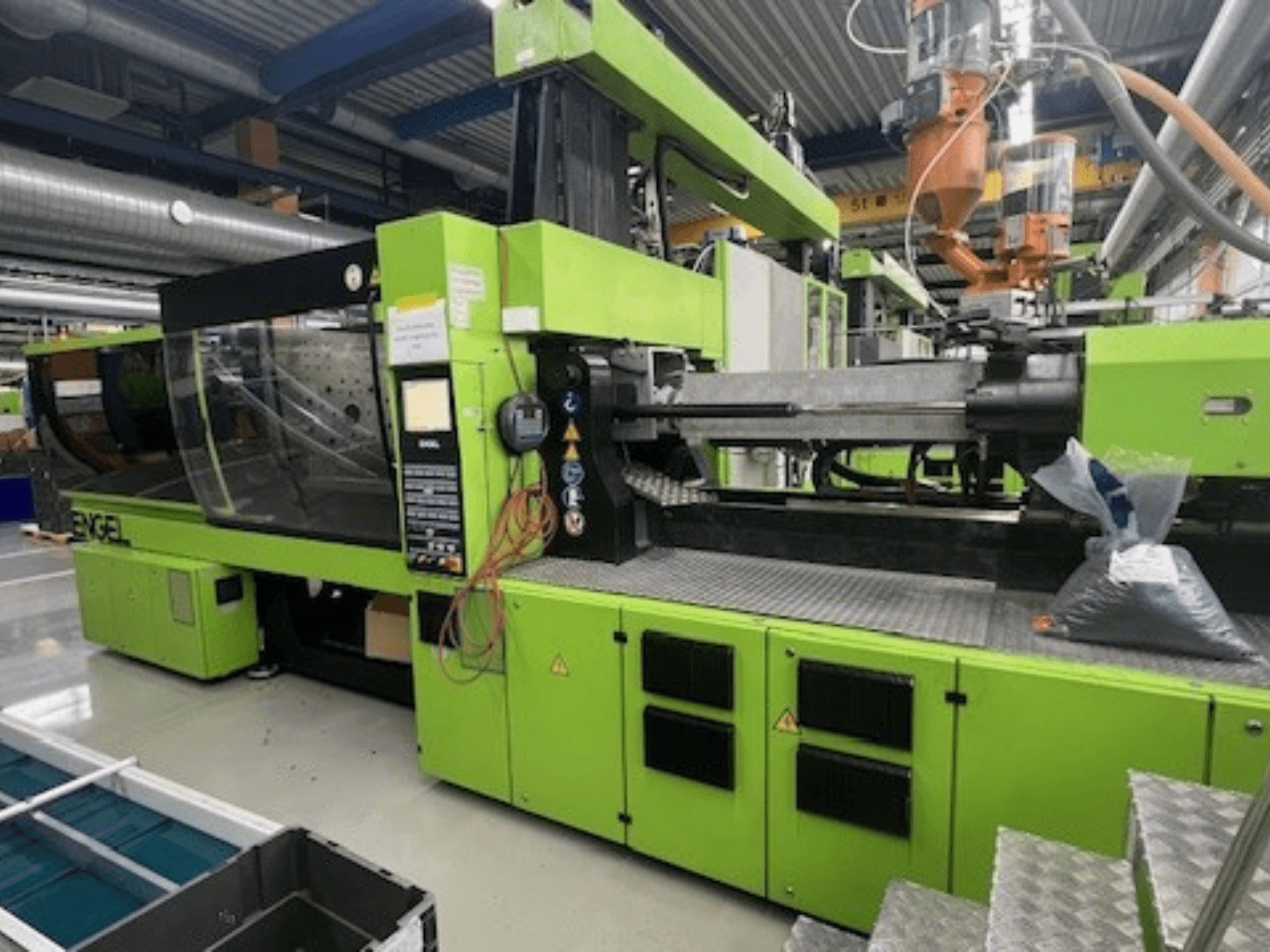 Engel Victory VC1800/300 P hydraulic injection moulding machine, green exterior, front view with control panel and workspace visible.