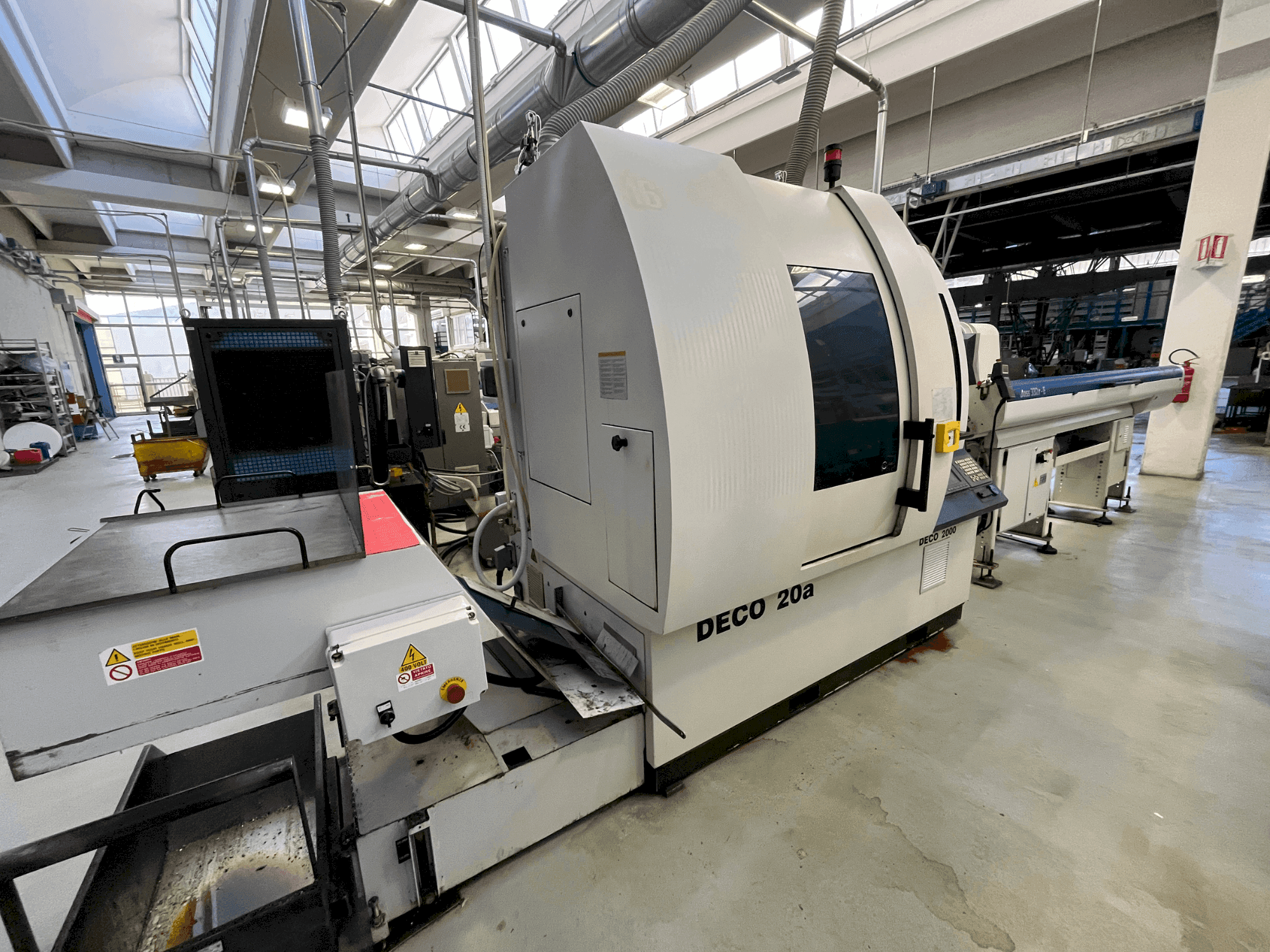 Front view of TORNOS DECO 20A machine