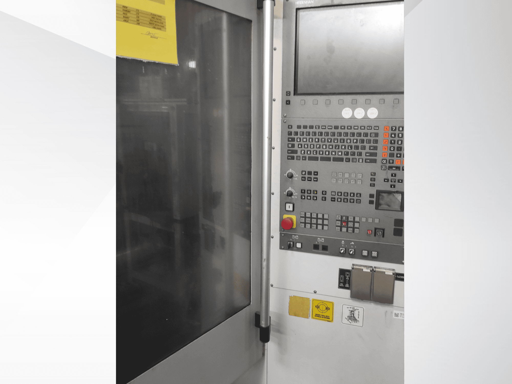 Control panel of Herrmann industrial machine, front view, featuring buttons, a touchscreen, and operational labels.
