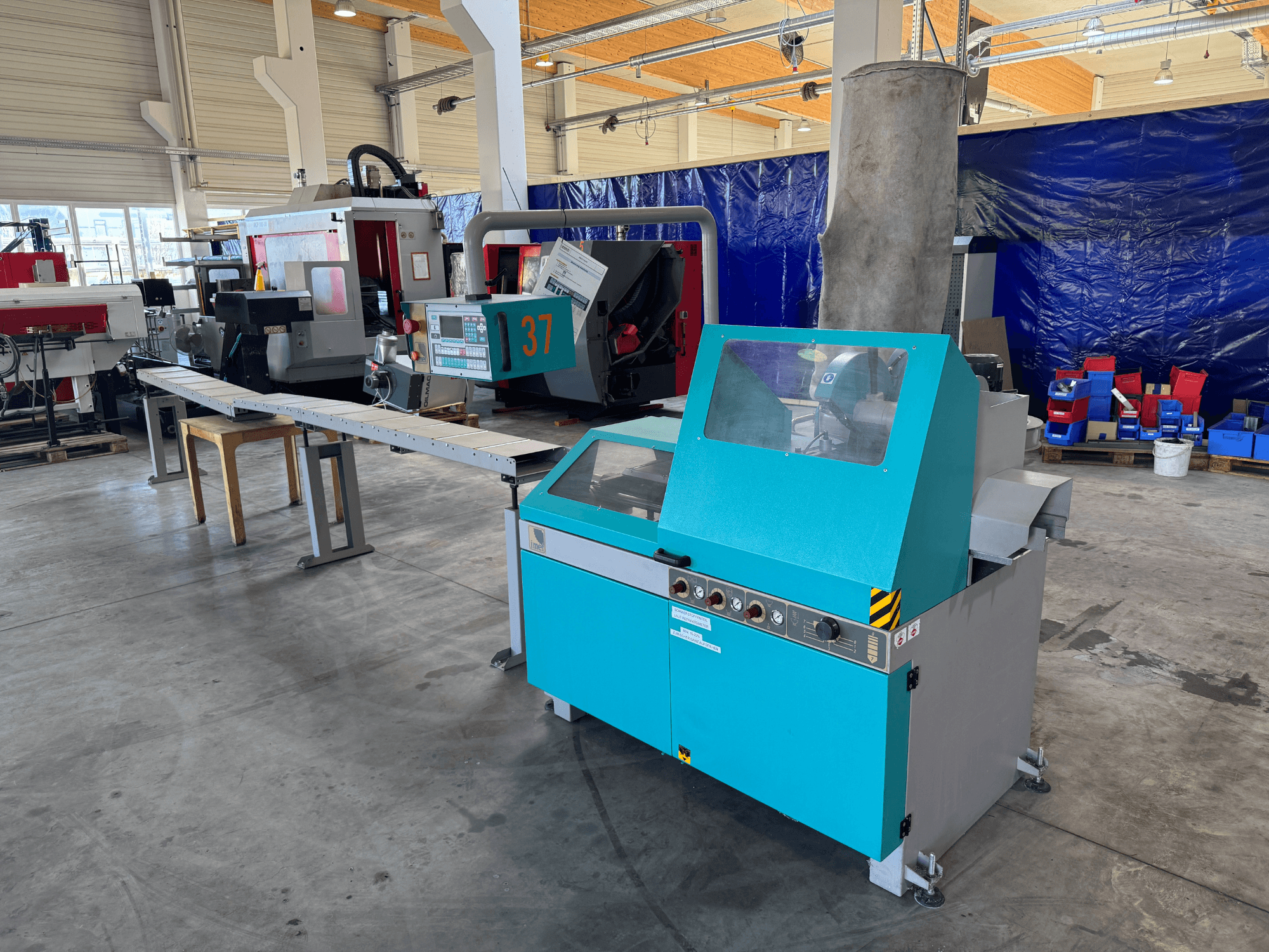 Imet VELOX 350 AF-ENC circular metal saw in a workshop, front view showing control panel and dust extraction system.