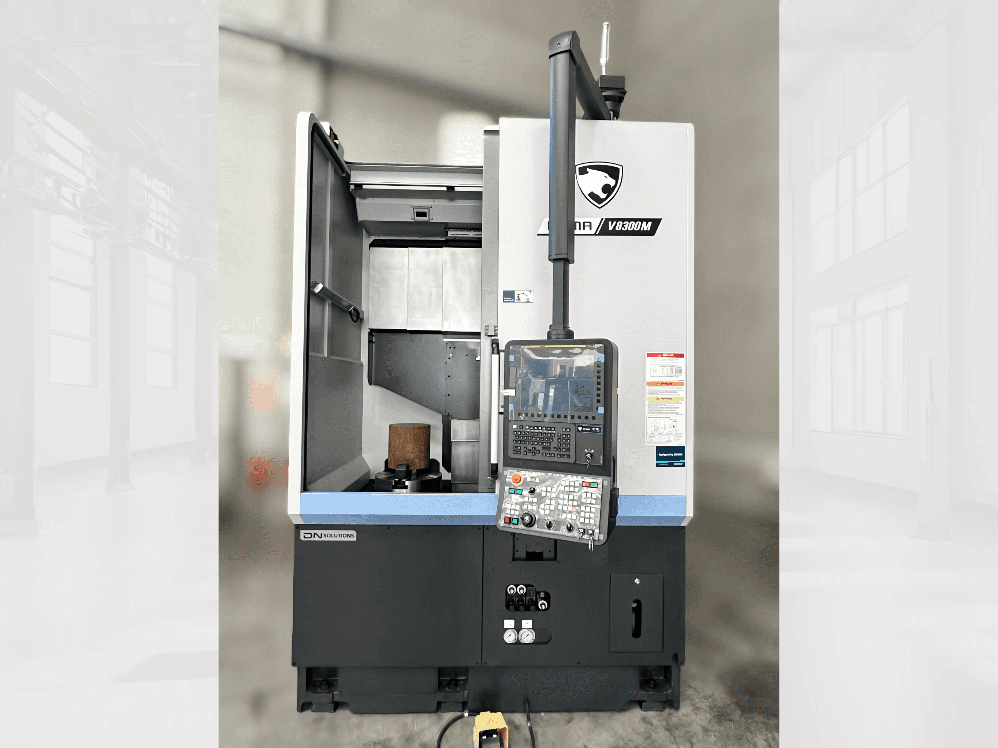 Puma V8300MR vertical turning machine in a front view, featuring a control panel and an open door showcasing the interior.