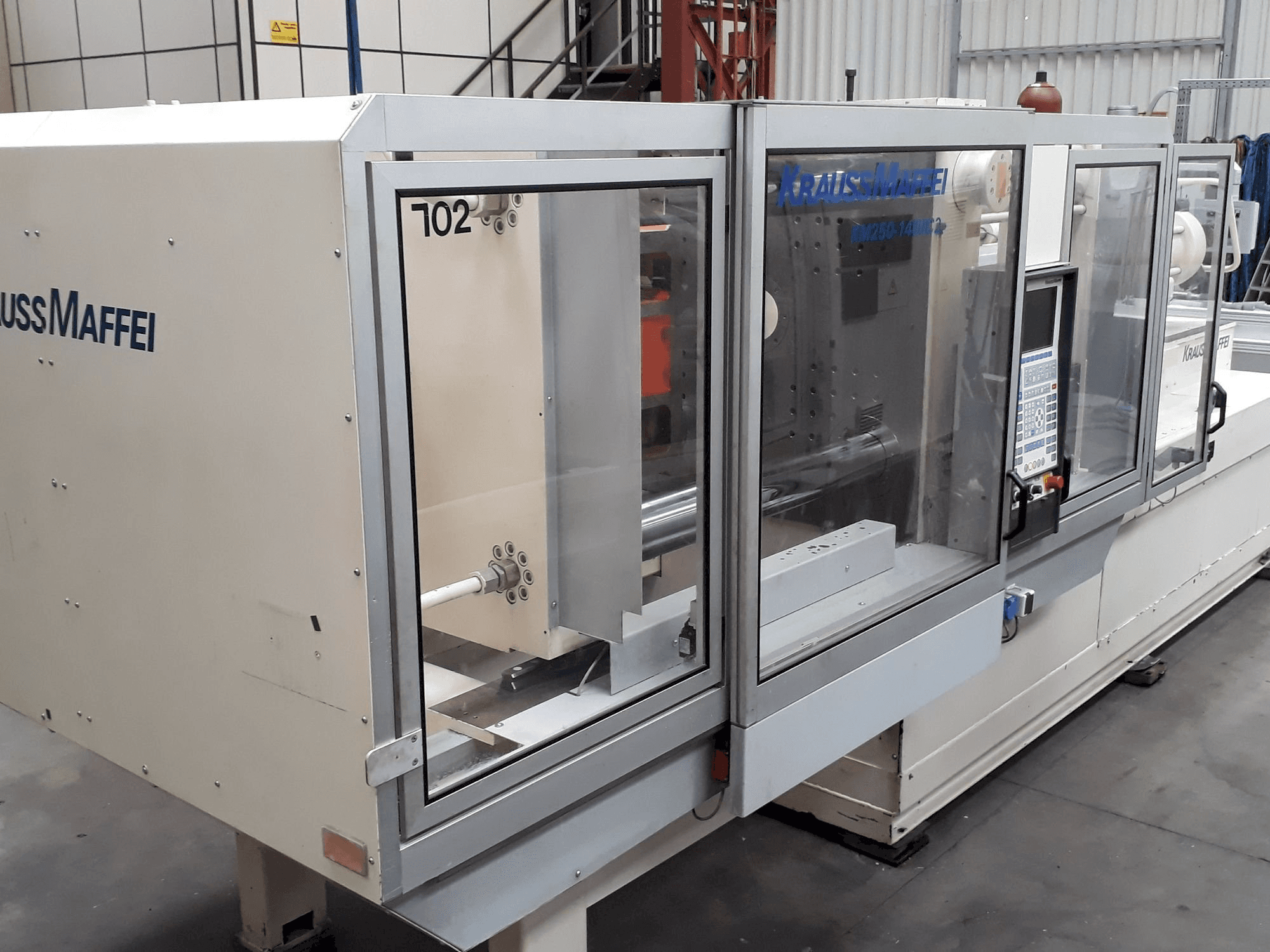 Front view of Krauss Maffei 250-1400 C2 machine