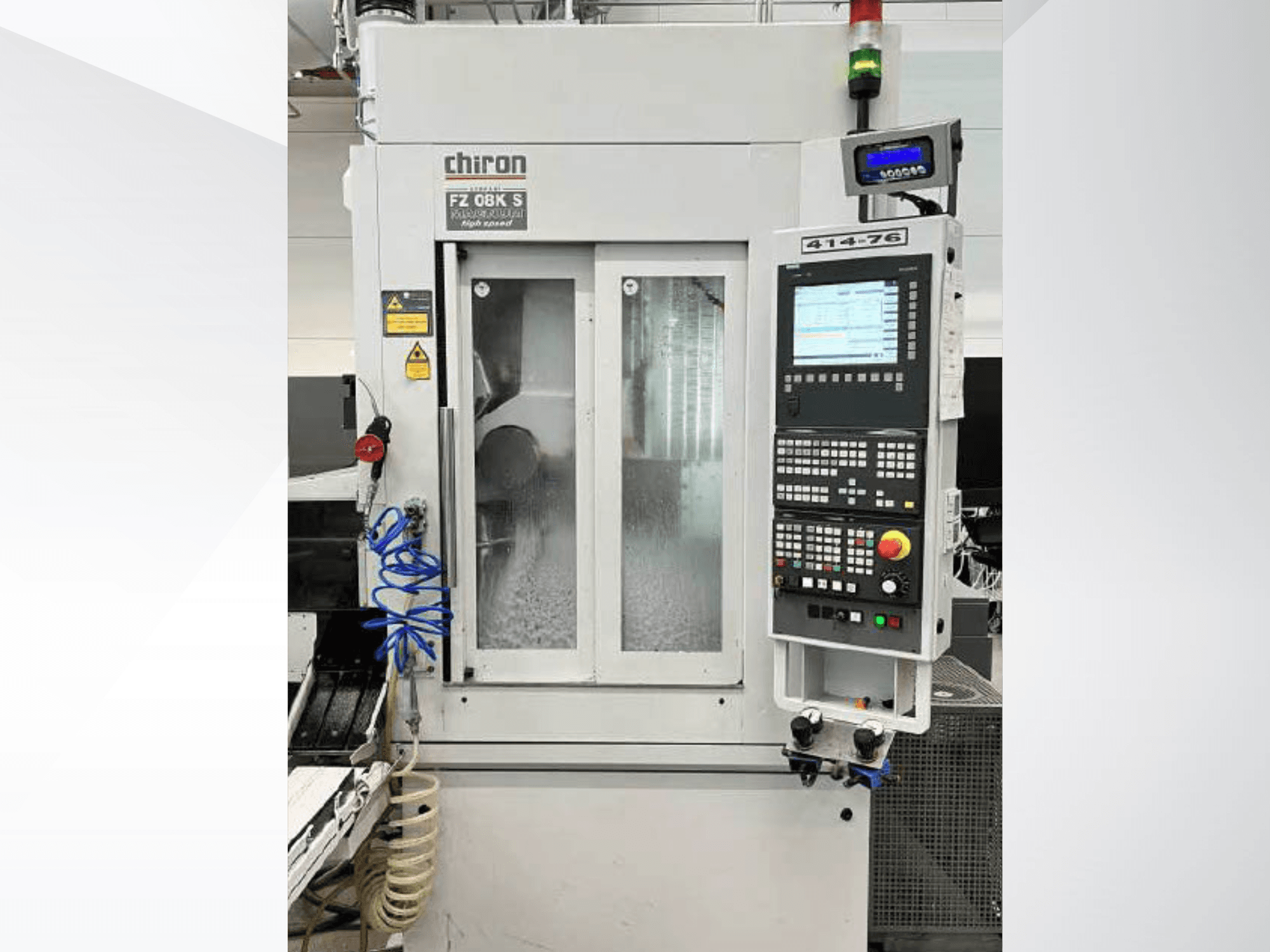 Front view of CHIRON FZ 08K S Magnum SK vertical machining centre, featuring control panel and tool access area.