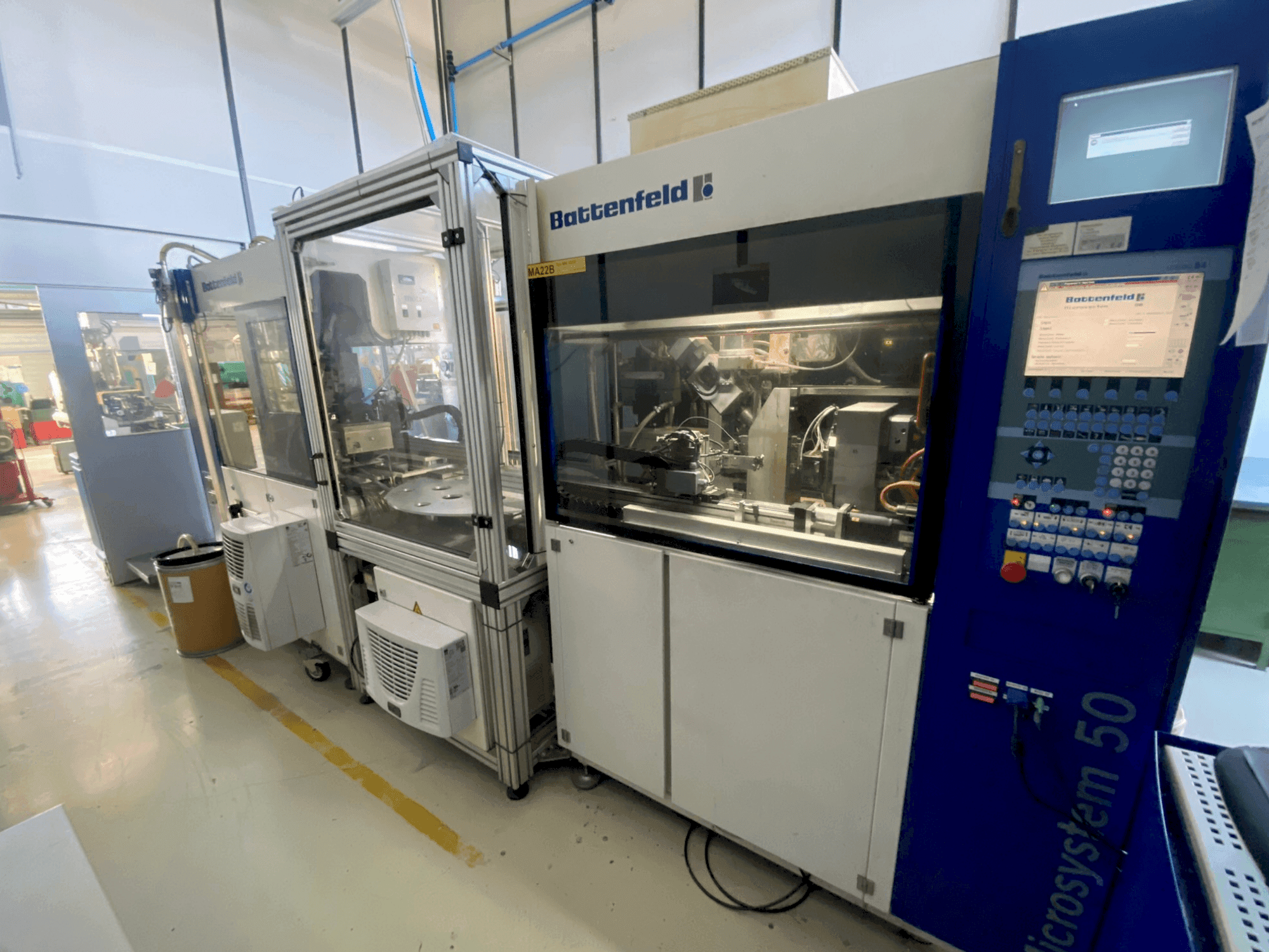 Front view of Battenfeld Microsystem MM 50/50 machine