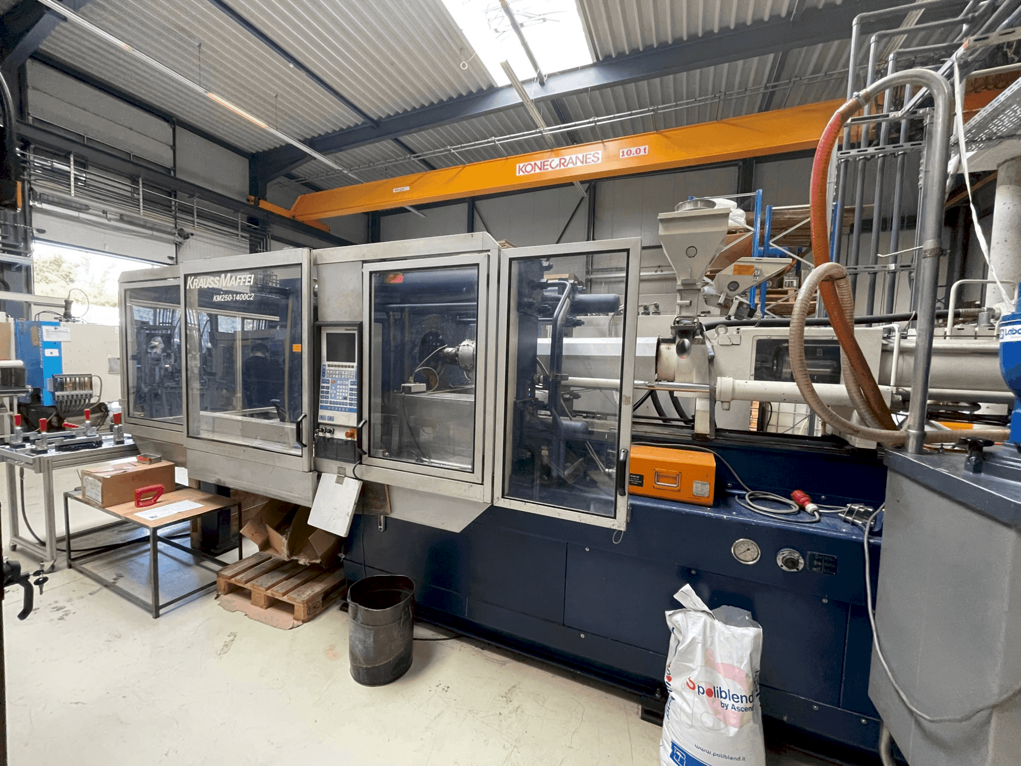 Front view of Krauss Maffei 250-1400 C2 machine